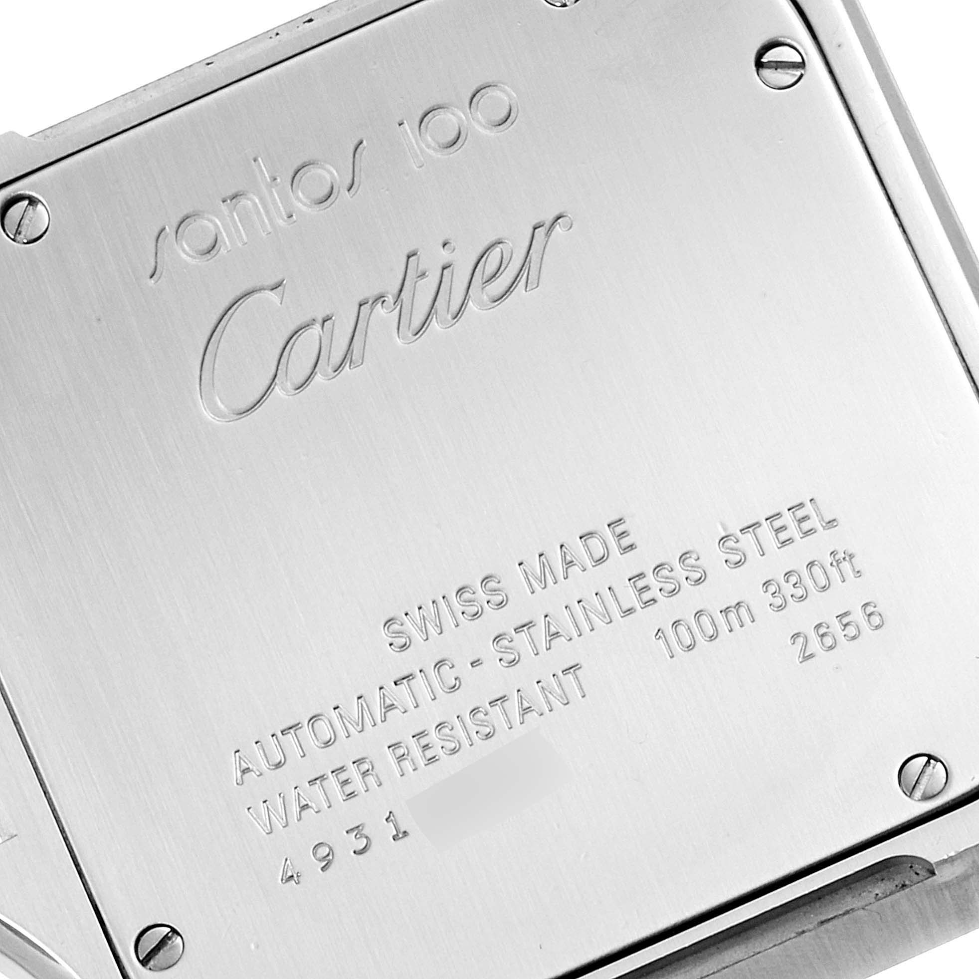 This image shows the case back of a Santos de Cartier watch, highlighting its engravings and screws.