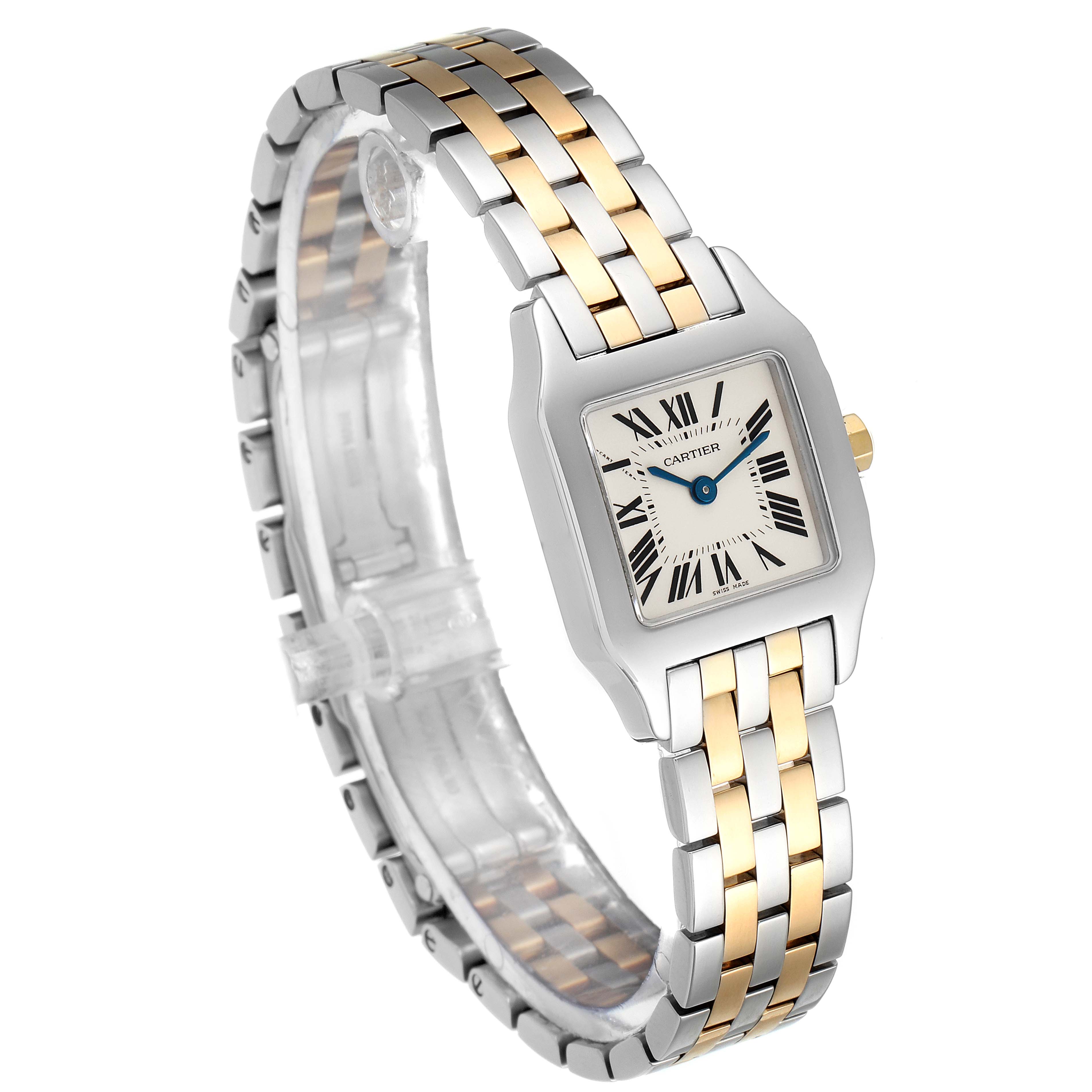 The Cartier Santos Demoiselle W25066Z6 Women
s Steel and Gold (two tone) Silver Dial W25066Z6 Women
s Steel and Gold (two tone) Silver Dial watch is shown at an angled view, highlighting its two-tone bracelet and rectangular face with Roman numerals.