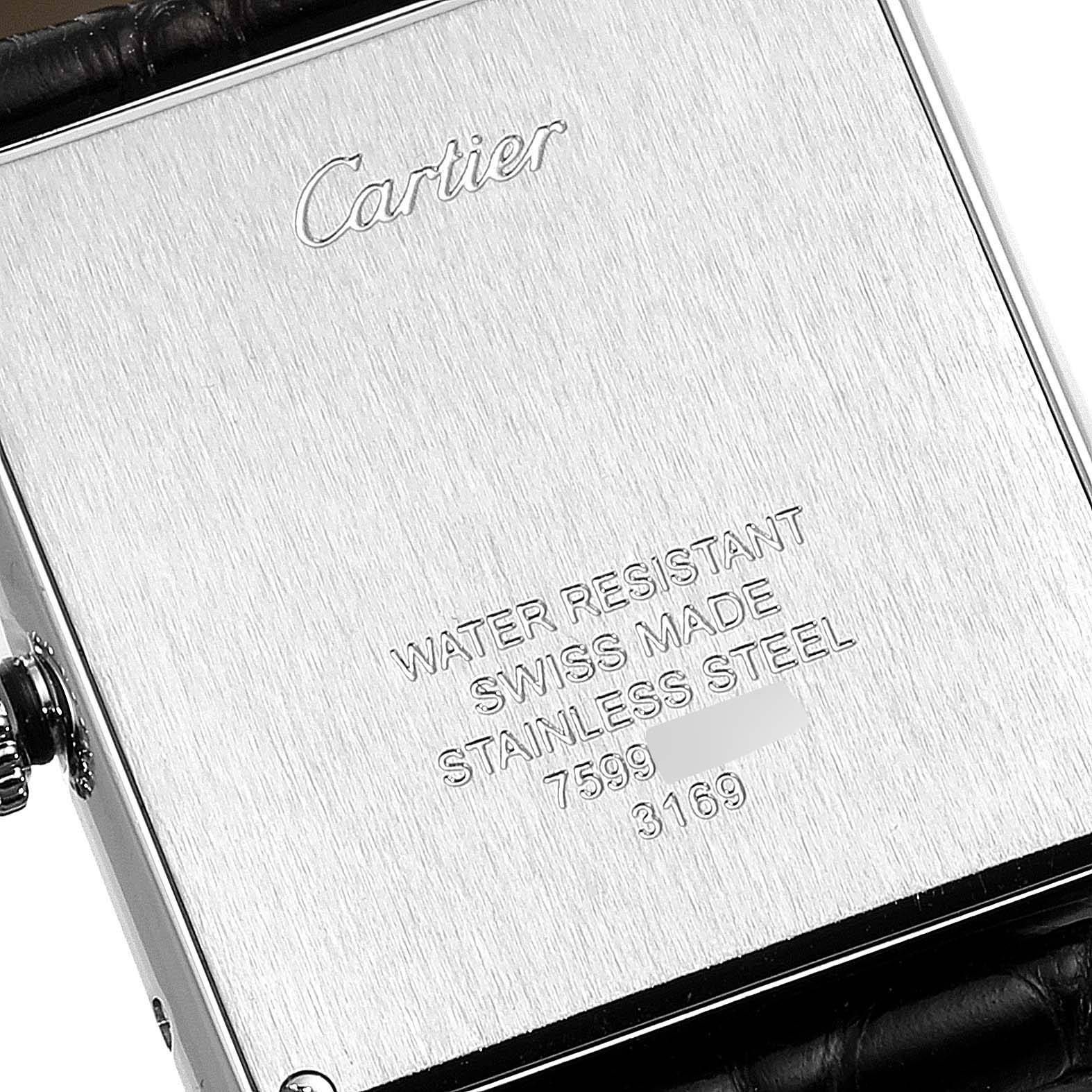 The image shows the back case of the Cartier Tank Solo W1018355 Men
s Stainless Steel Silver Dial W1018355 Men
s Stainless Steel Silver Dial watch, displaying the brand name, water resistance, and material details.