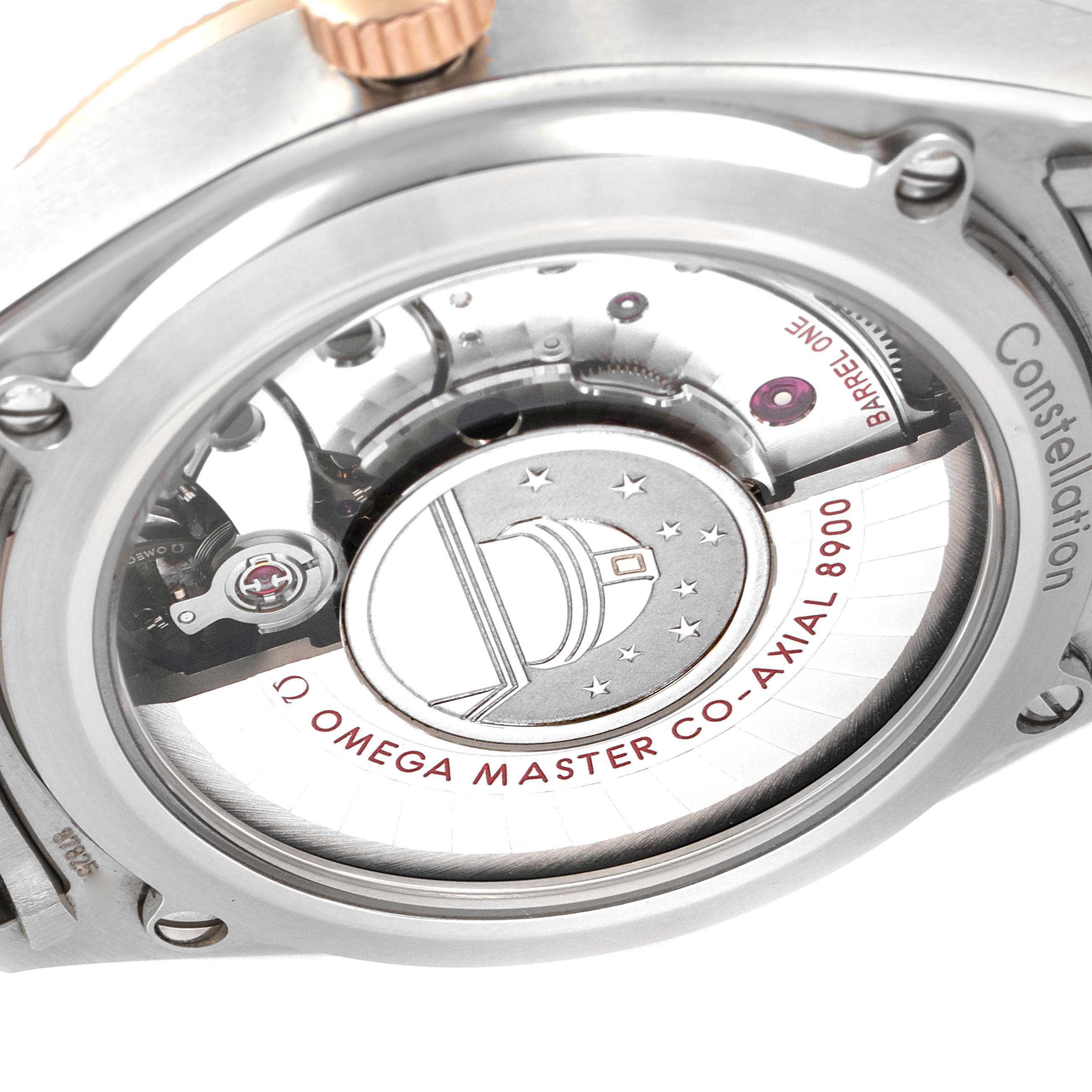 This image shows the back view of an Omega Constellation 130.20.39.21.03.001 Men's Steel and Gold (two tone) Blue Dial 130.20.39.21.03.001 Men's Steel and Gold (two tone) Blue Dial watch, focusing on its exposed mechanical movement.