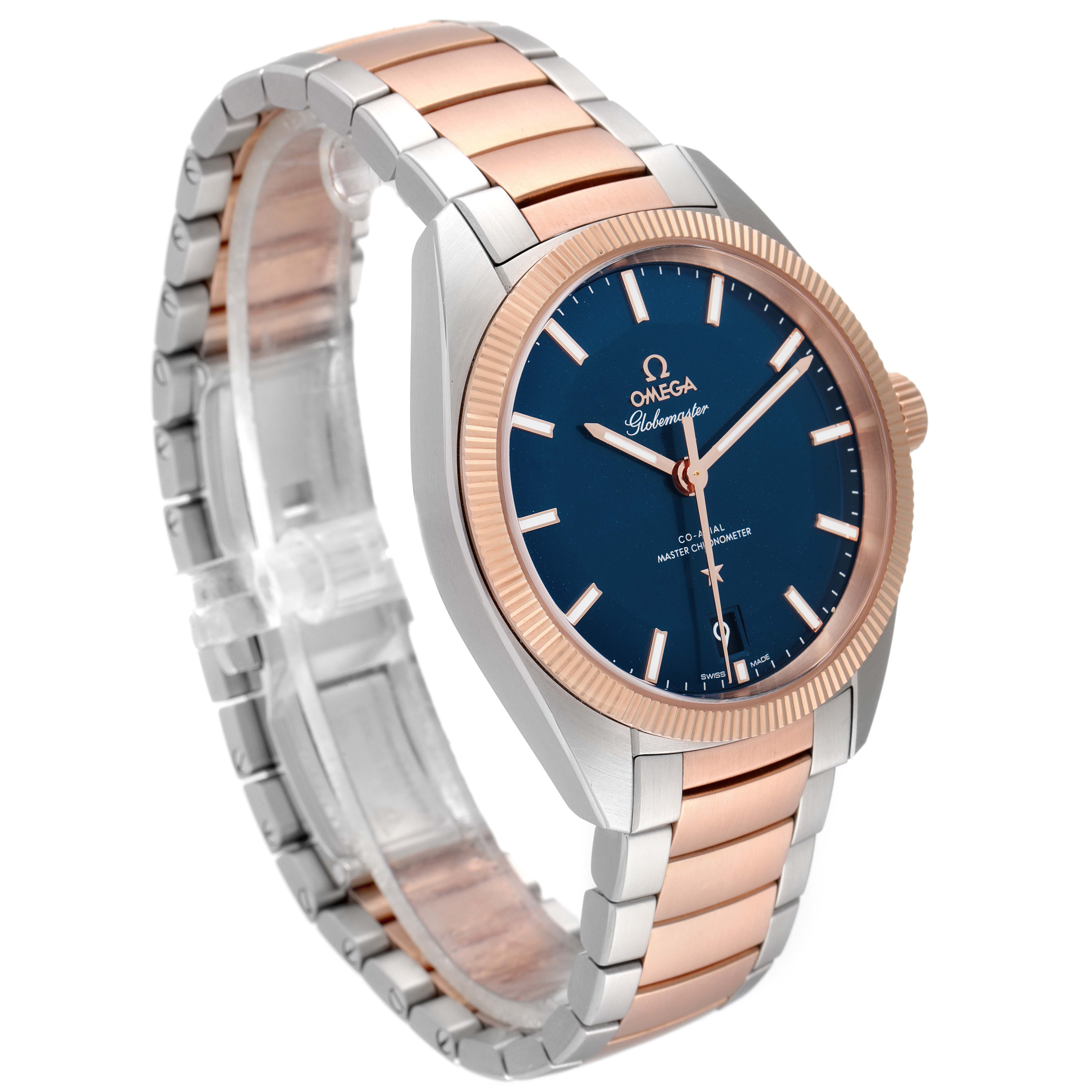 The image shows an Omega Constellation 130.20.39.21.03.001 Men's Steel and Gold (two tone) Blue Dial 130.20.39.21.03.001 Men's Steel and Gold (two tone) Blue Dial watch from a three-quarter angle, highlighting its blue dial, gold bezel, and two-tone bracelet.