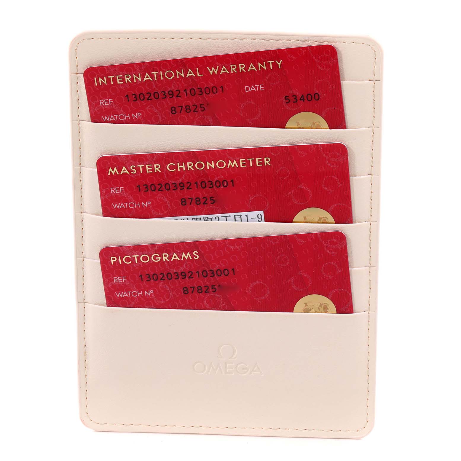 The image shows Omega certification cards for a Constellation model in a branded cardholder.
