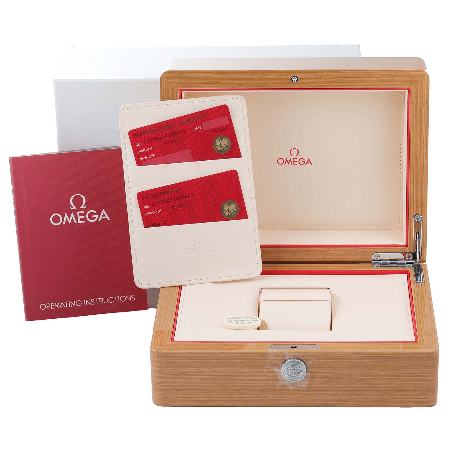 The image shows the packaging, warranty cards, and operating instructions for the Omega Planet Ocean 232.90.42.21.03.001 Men
s Stainless Steel Blue Dial 232.90.42.21.03.001 Men
s Stainless Steel Blue Dial watch.