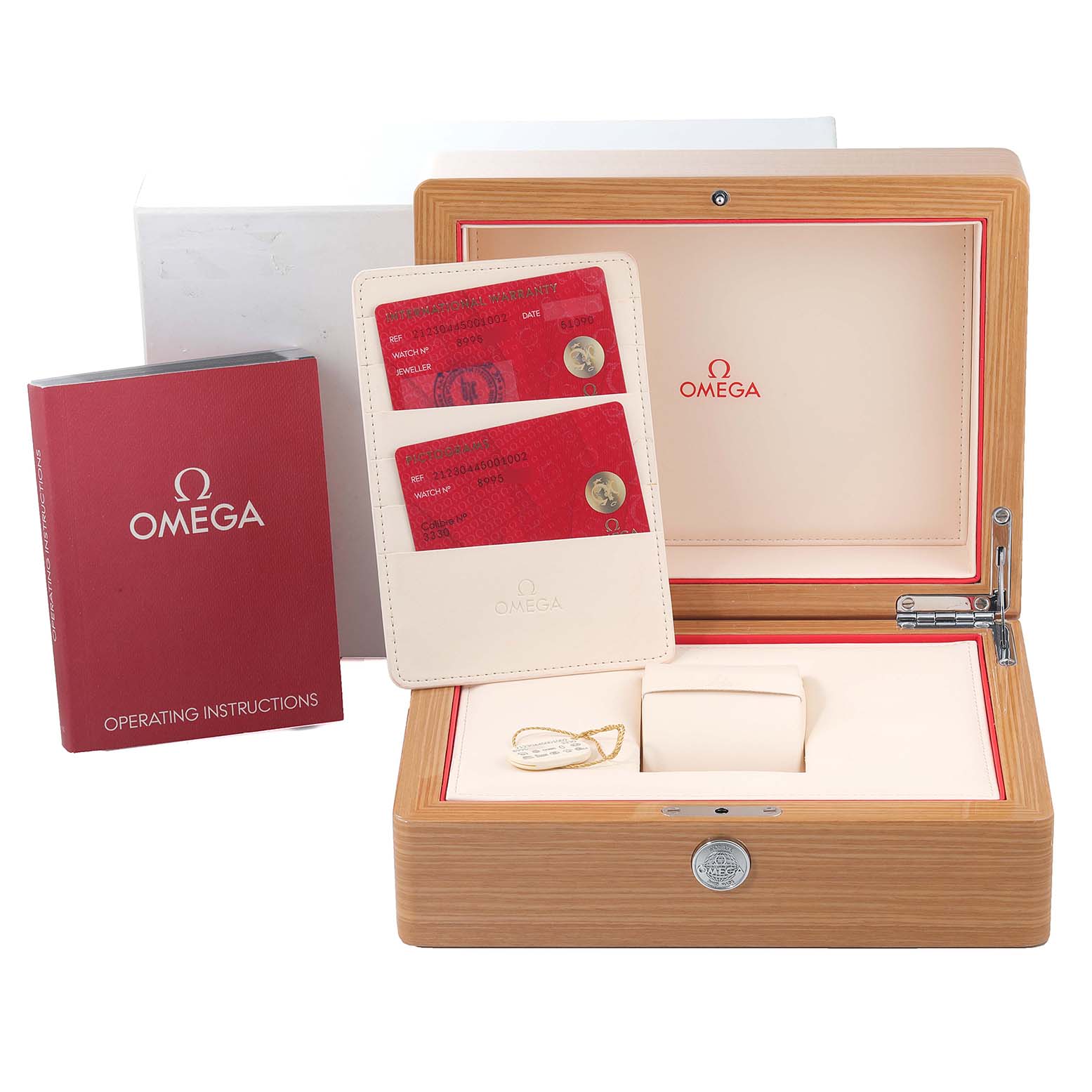 The image shows the packaging, operating instructions, and cards for the Omega Seamaster 212.30.44.50.01.002 Men's Stainless Steel Black Dial 212.30.44.50.01.002 Men's Stainless Steel Black Dial watch.