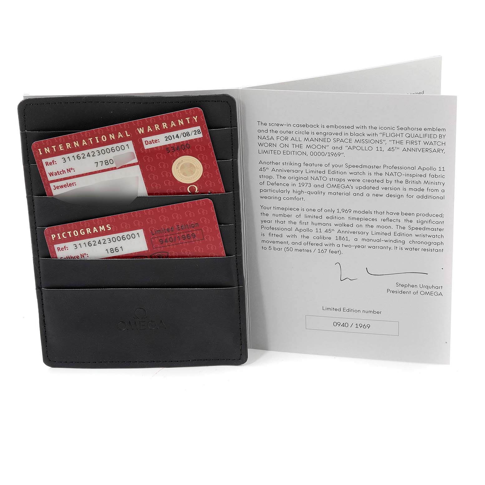 The image shows the warranty and pictogram cards along with documentation for the Omega Speedmaster 311.62.42.30.06.001 Men's Titanium Grey Dial 311.62.42.30.06.001 Men's Titanium Grey Dial watch.