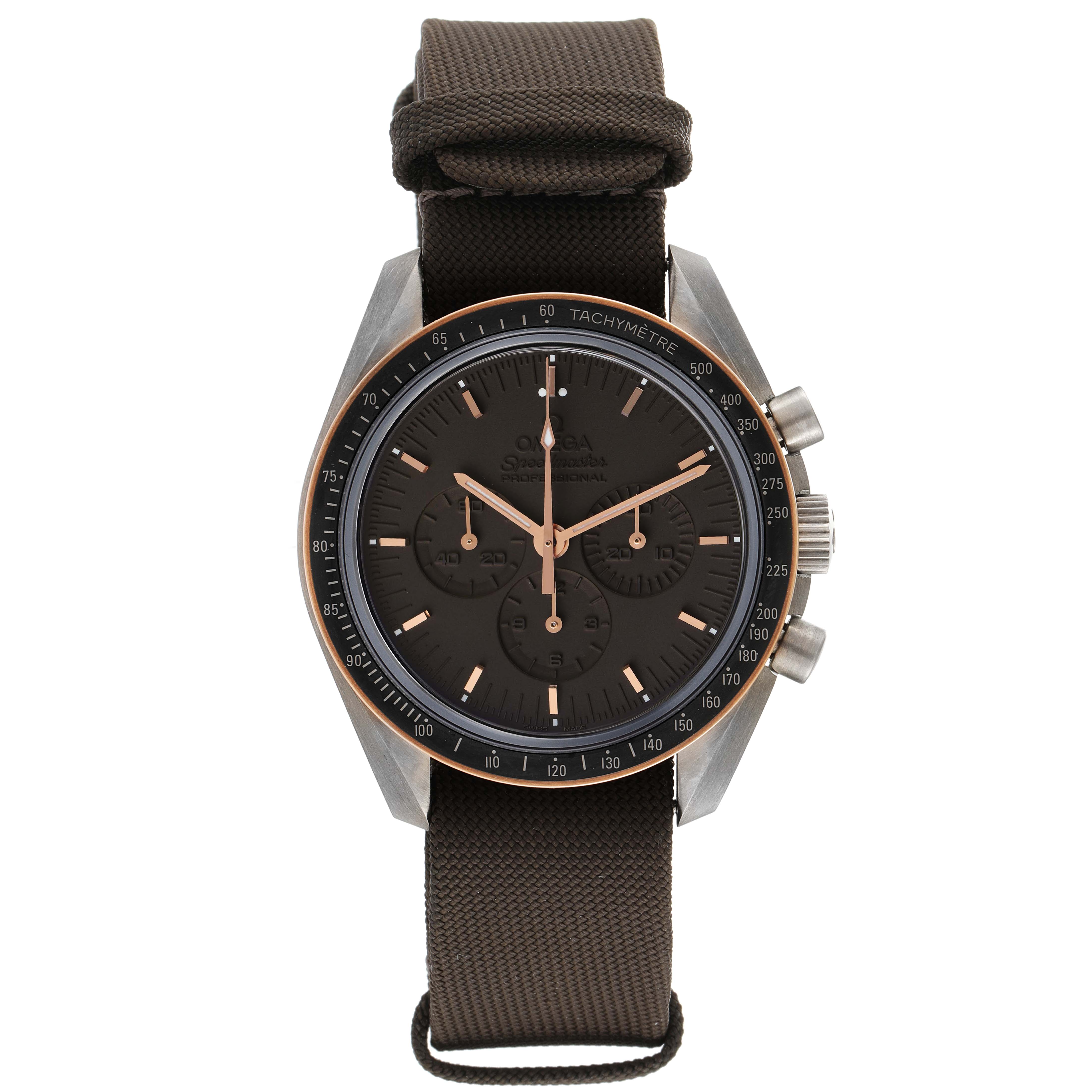 The image shows a front view of an Omega Speedmaster 311.62.42.30.06.001 Men's Titanium Grey Dial 311.62.42.30.06.001 Men's Titanium Grey Dial watch with a dark dial and a brown fabric strap.