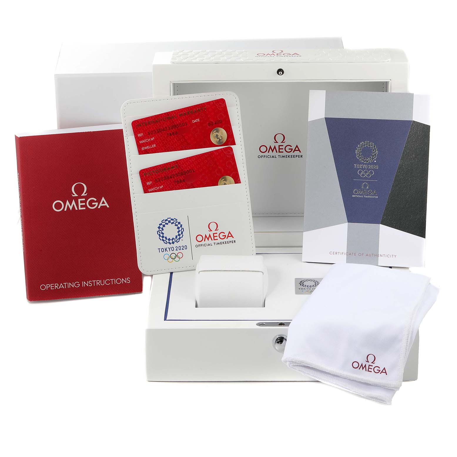 The image shows the packaging and accessories for an Omega Speedmaster 522.30.42.30.03.001 Men
s Stainless Steel Blue Dial 522.30.42.30.03.001 Men
s Stainless Steel Blue Dial, including manuals, certificates, and a cloth.