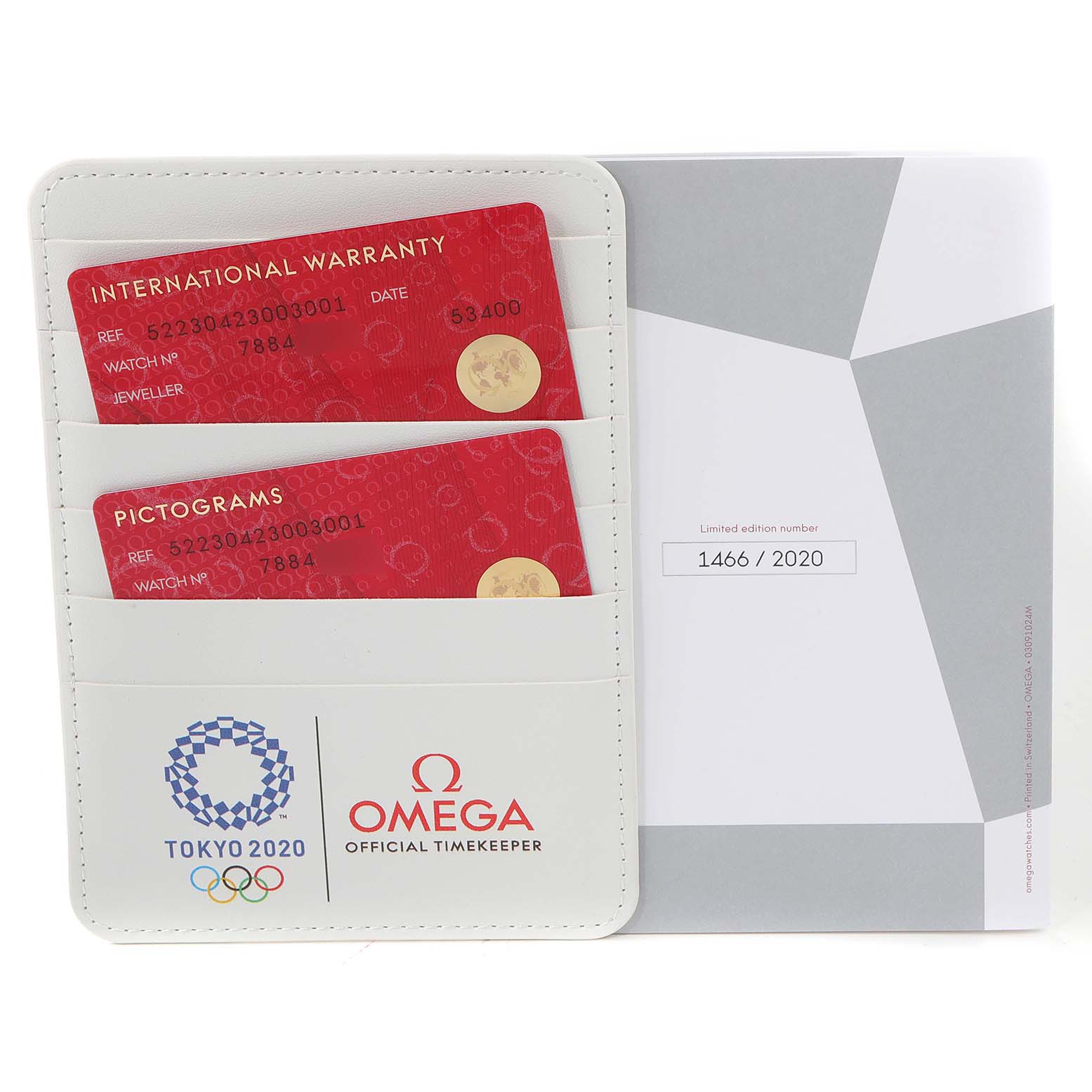 The image shows an Omega Speedmaster 522.30.42.30.03.001 Men
s Stainless Steel Blue Dial 522.30.42.30.03.001 Men
s Stainless Steel Blue Dial watch
s warranty cards and limited edition certificate.