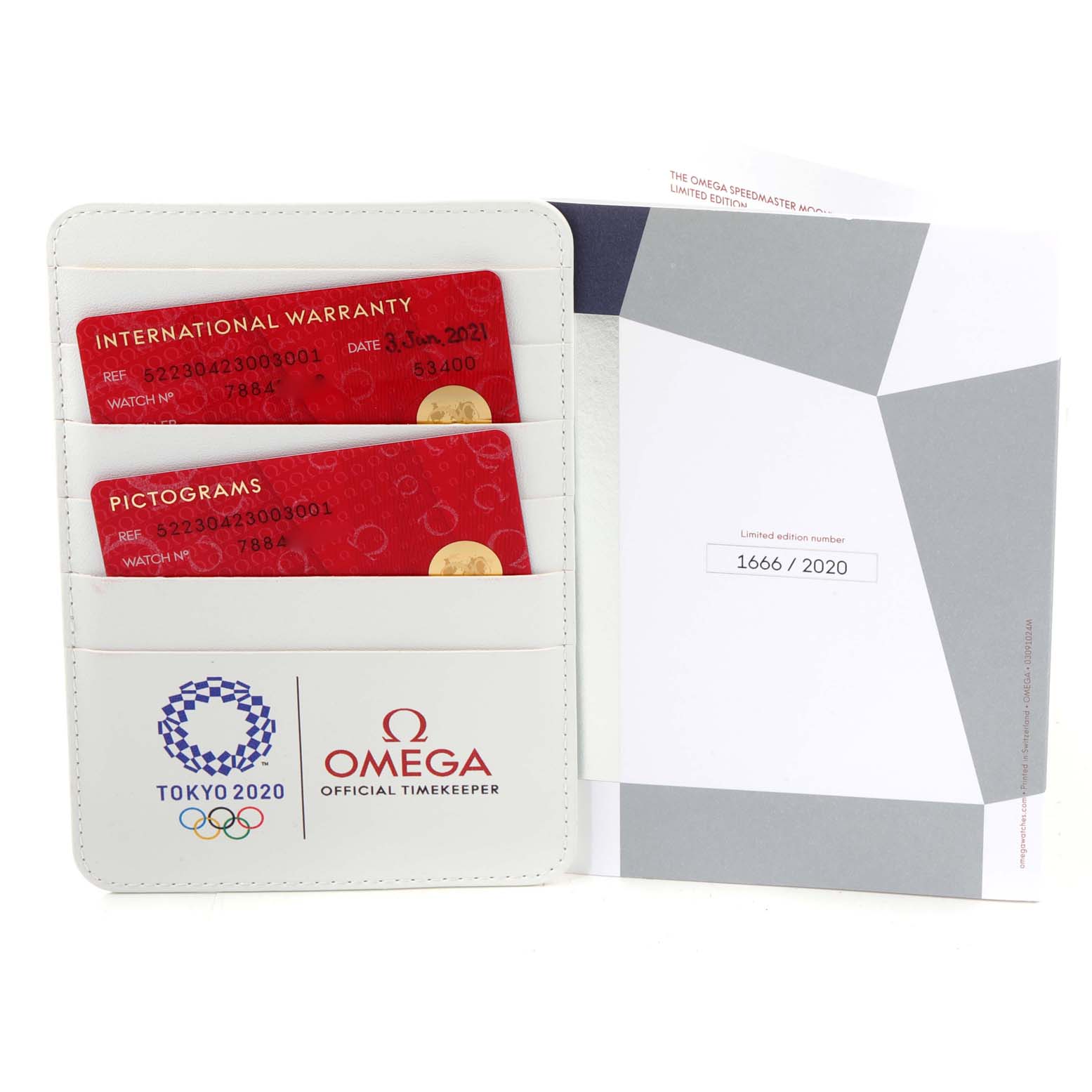 The image shows the international warranty cards and limited edition booklet for the Omega Speedmaster 522.30.42.30.03.001 Men's Stainless Steel Blue Dial 522.30.42.30.03.001 Men's Stainless Steel Blue Dial Tokyo 2020 model.