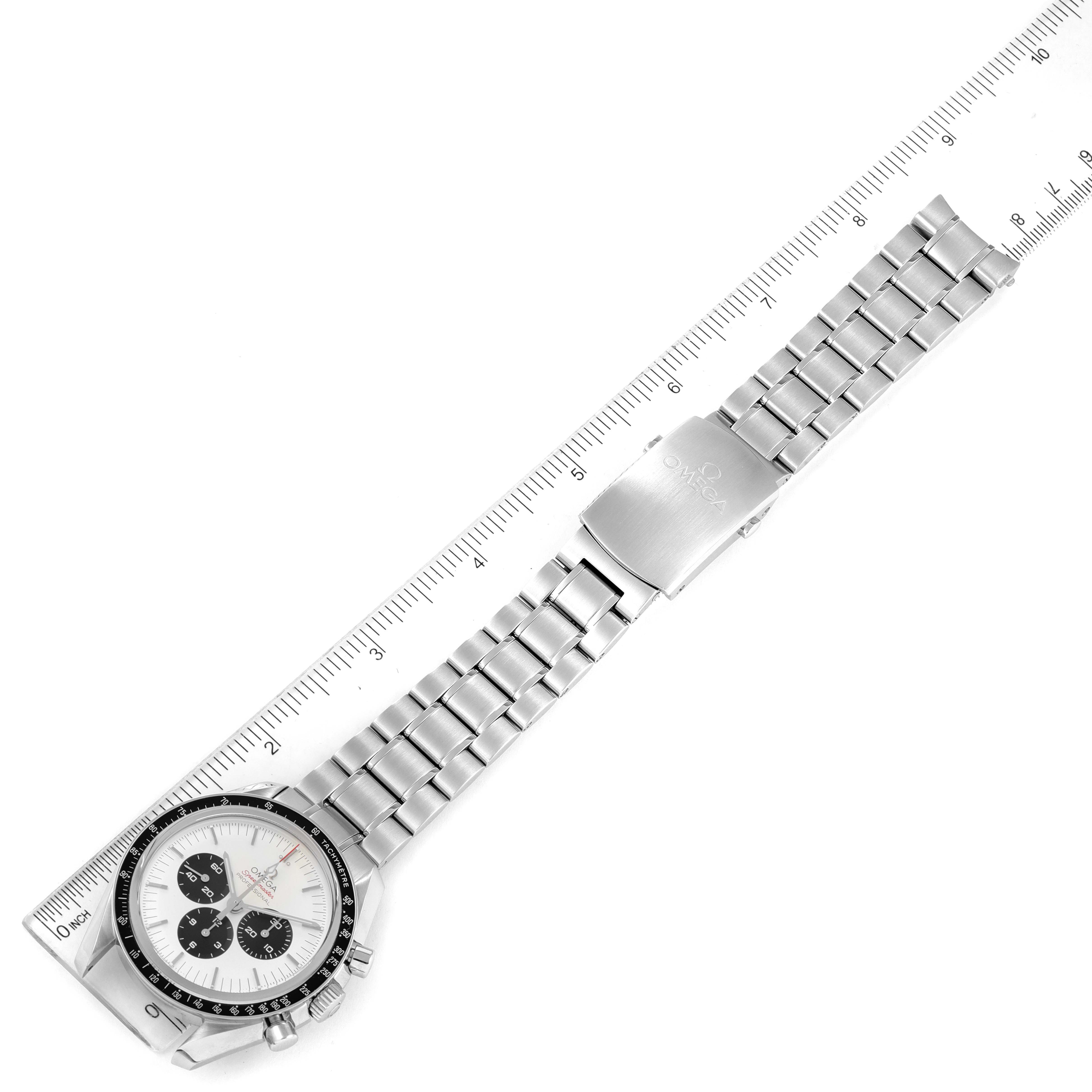 The image shows an Omega Speedmaster 522.30.42.30.04.001 Men's Stainless Steel White Dial 522.30.42.30.04.001 Men's Stainless Steel White Dial watch laid flat with the face, bezel, bracelet, and clasp visible next to a ruler for scale.