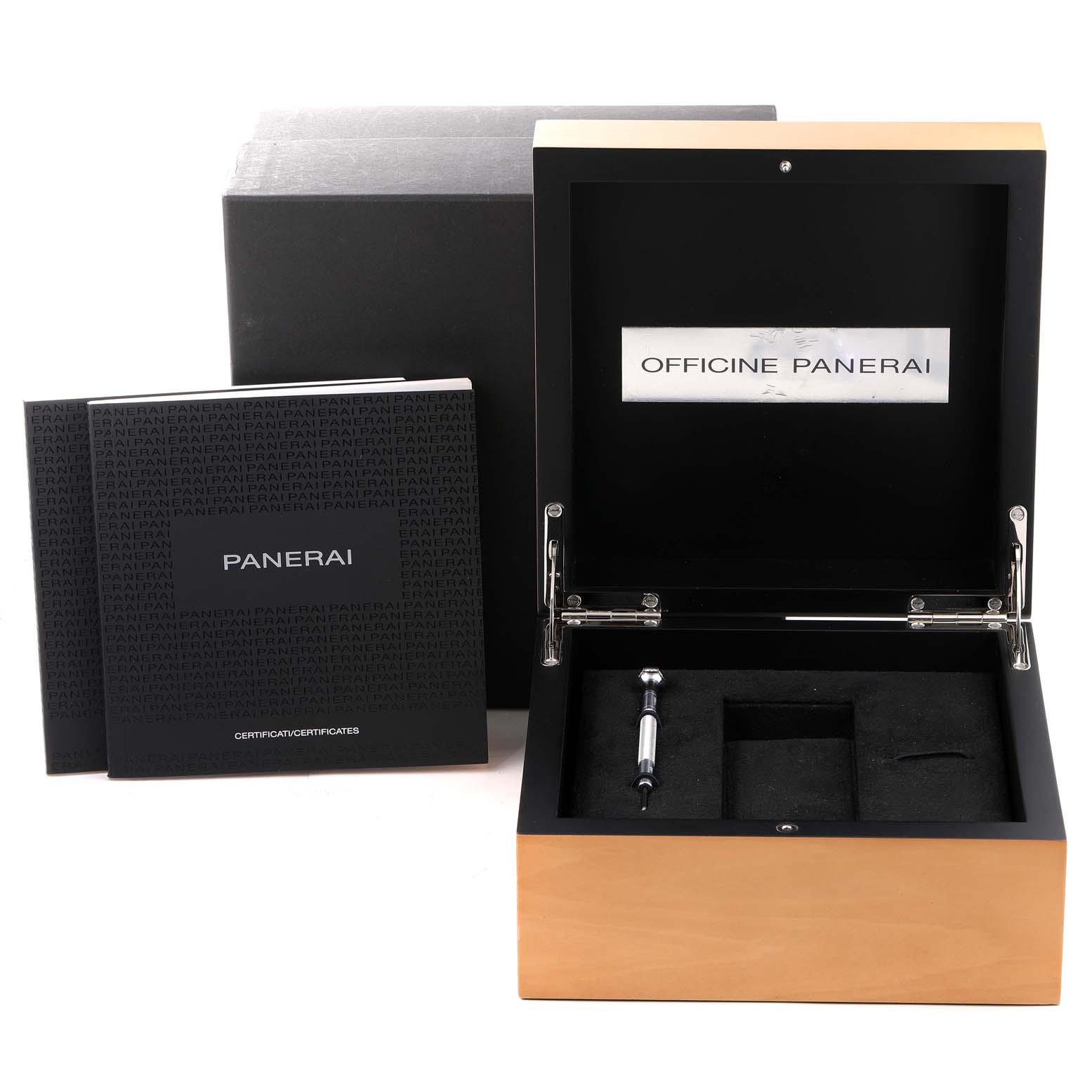This image shows the packaging and accessories for the Luminor model by Panerai, featuring an open box and documentations.