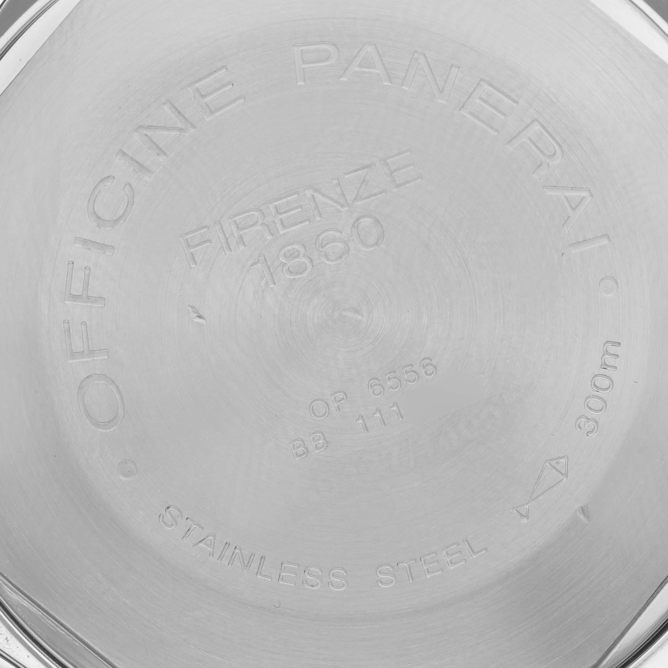 The image shows the back case of a Panerai Luminor PAM00090 Men
s Stainless Steel Black Dial PAM00090 Men
s Stainless Steel Black Dial watch, displaying engravings and specifications.