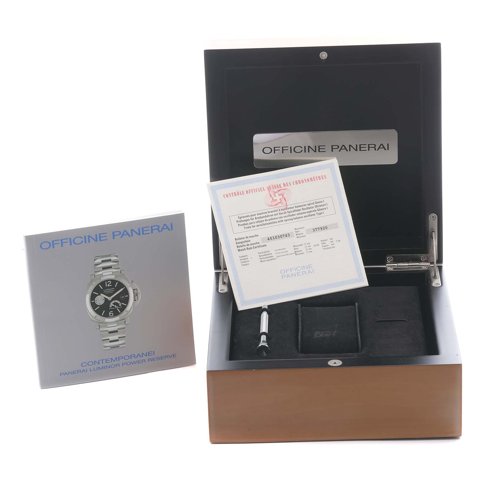 The image shows a Panerai Luminor PAM00090 Men
s Stainless Steel Black Dial PAM00090 Men
s Stainless Steel Black Dial watch box with certification papers, a manual, and a tool, from a straight-on angle.