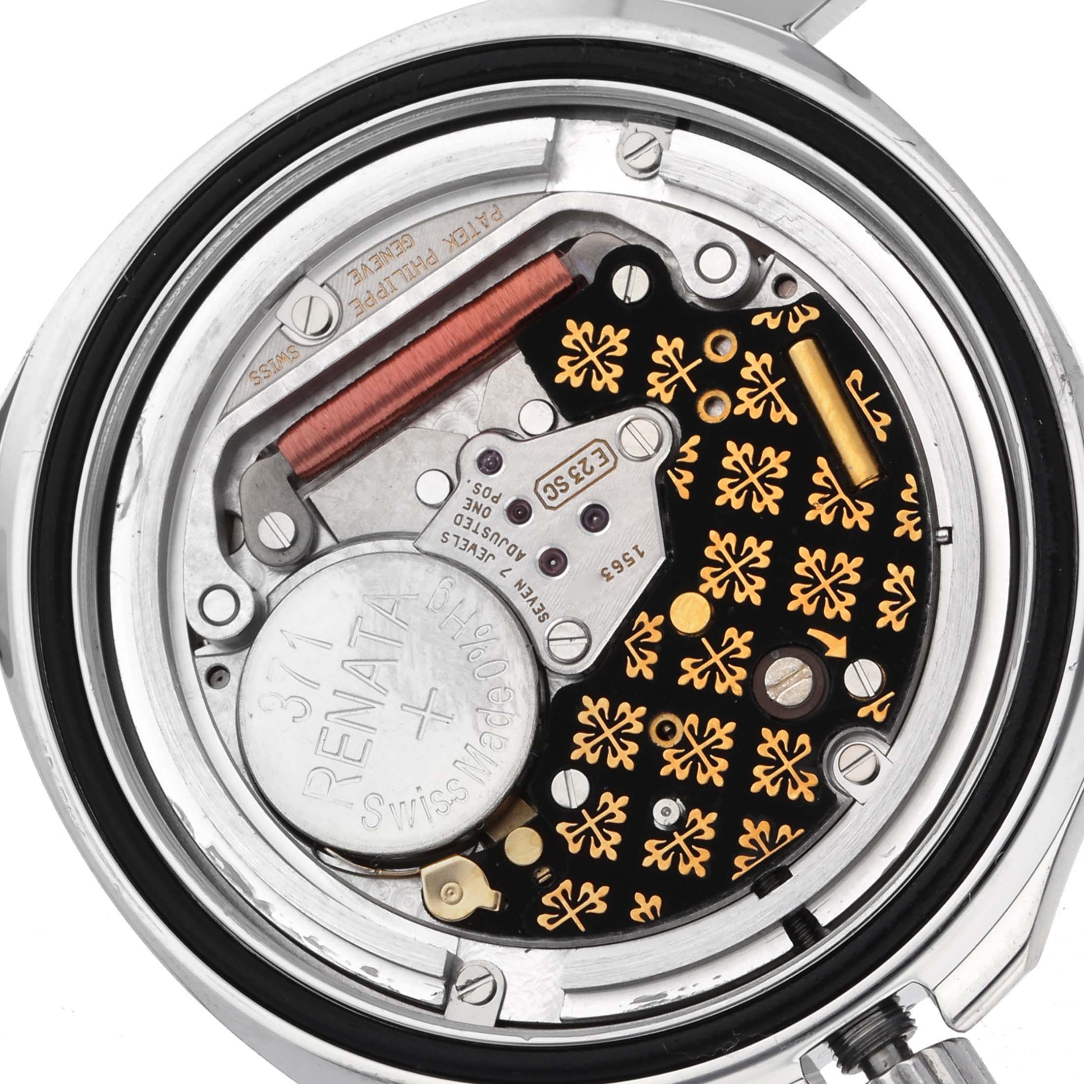 The image shows the intricate back casing and movement of the Patek Philippe Aquanaut 5067A-027 Women's Stainless Steel Red Dial 5067A-027 Women's Stainless Steel Red Dial watch.