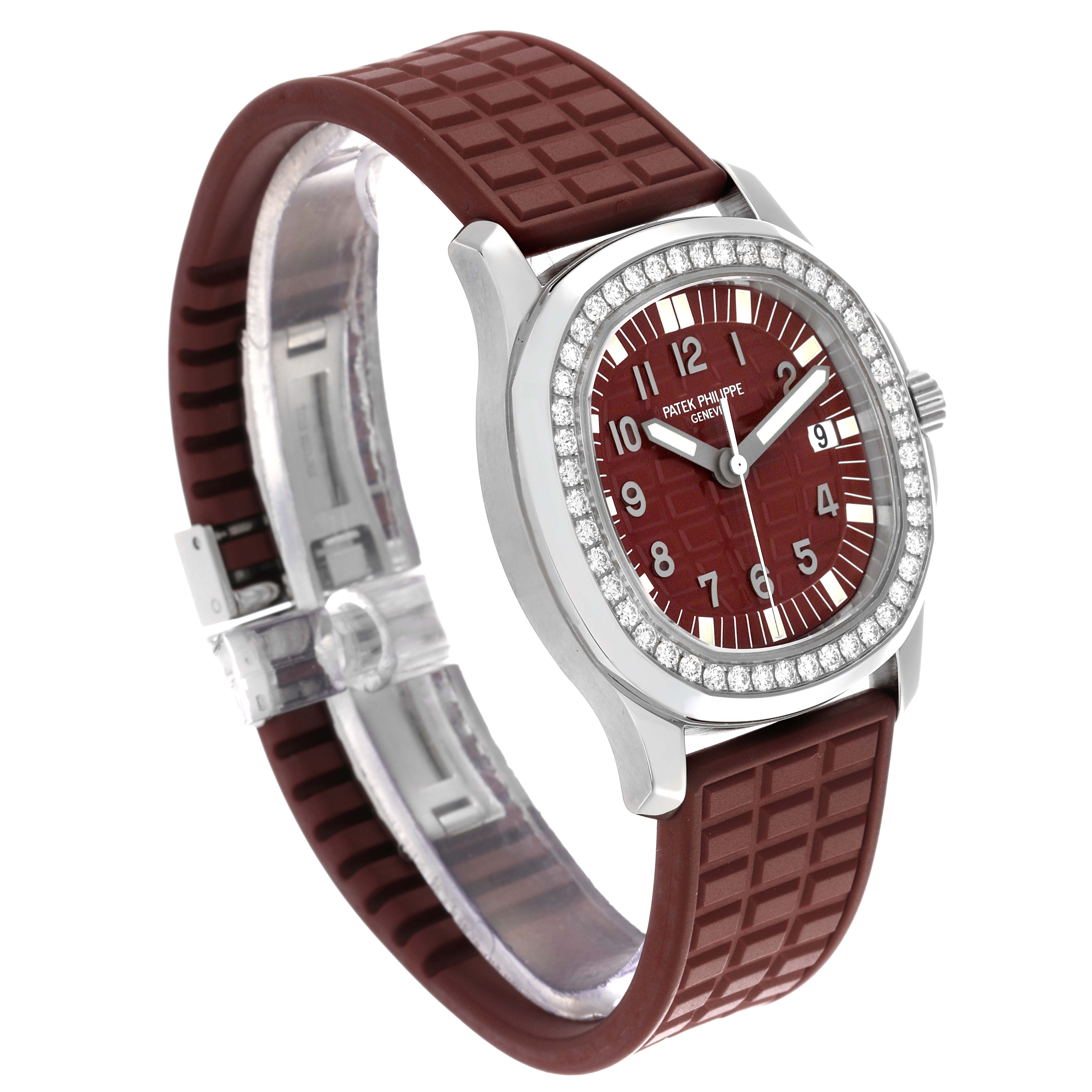 The Patek Philippe Aquanaut 5067A-027 Women's Stainless Steel Red Dial 5067A-027 Women's Stainless Steel Red Dial watch is shown at a slight angle, highlighting the dial, bezel, and strap.