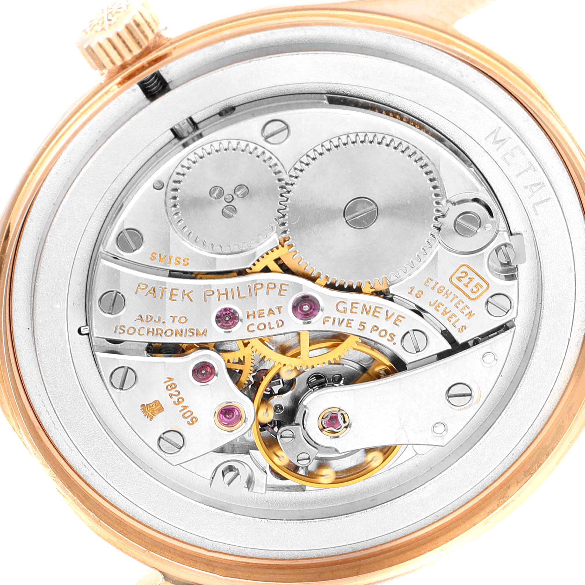 The image shows the back view of the Patek Philippe Calatrava 3923R Men's Rose Gold Silver Dial 3923R Men's Rose Gold Silver Dial watch, displaying its intricate mechanical movement.