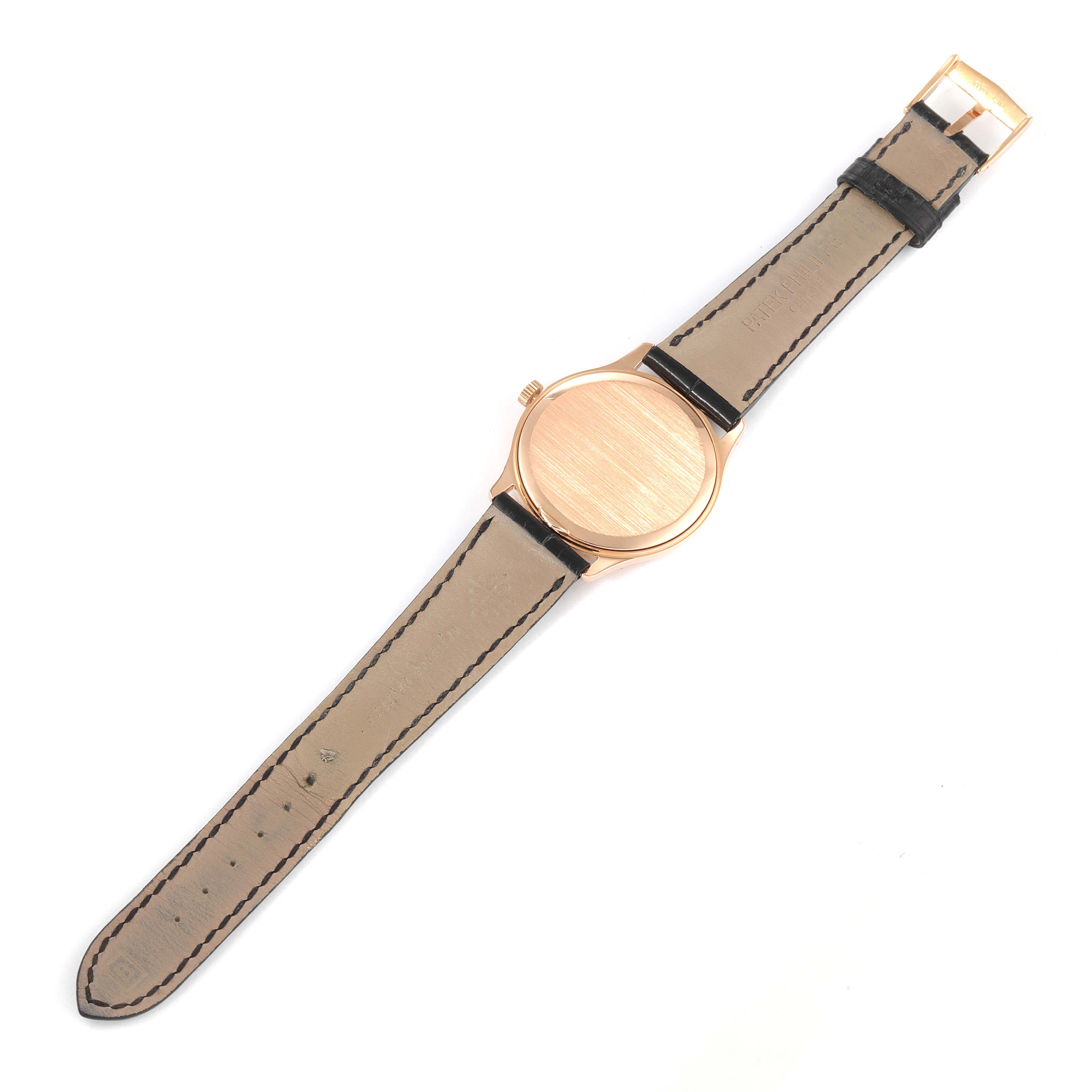 The image shows the back view of a Patek Philippe Calatrava 3923R Men's Rose Gold Silver Dial 3923R Men's Rose Gold Silver Dial watch with its straps fully extended.