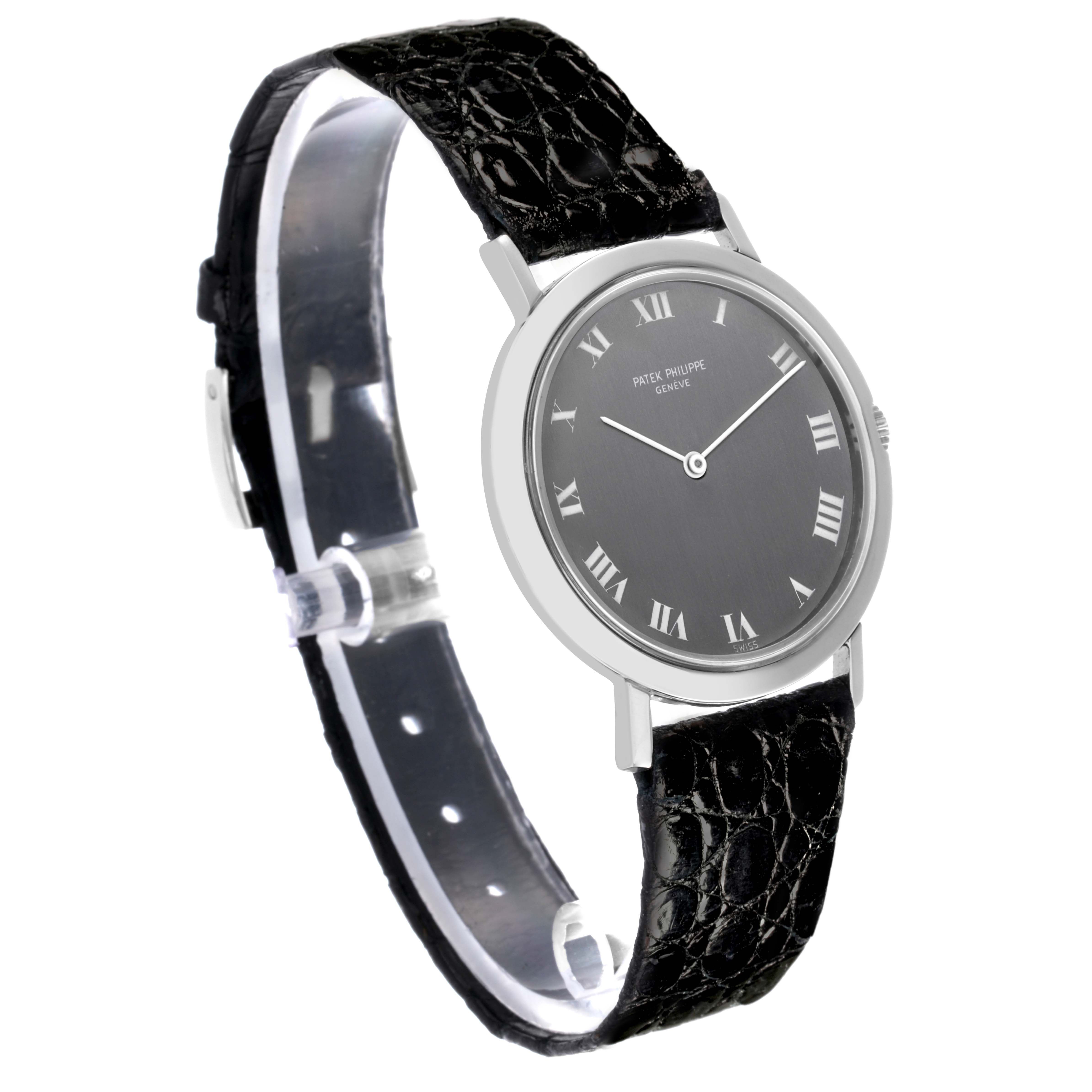 The Patek Philippe Calatrava 3509A Men's Stainless Steel Grey Dial 3509A Men's Stainless Steel Grey Dial watch is shown at a three-quarter angle, highlighting the dial, case, and leather strap.