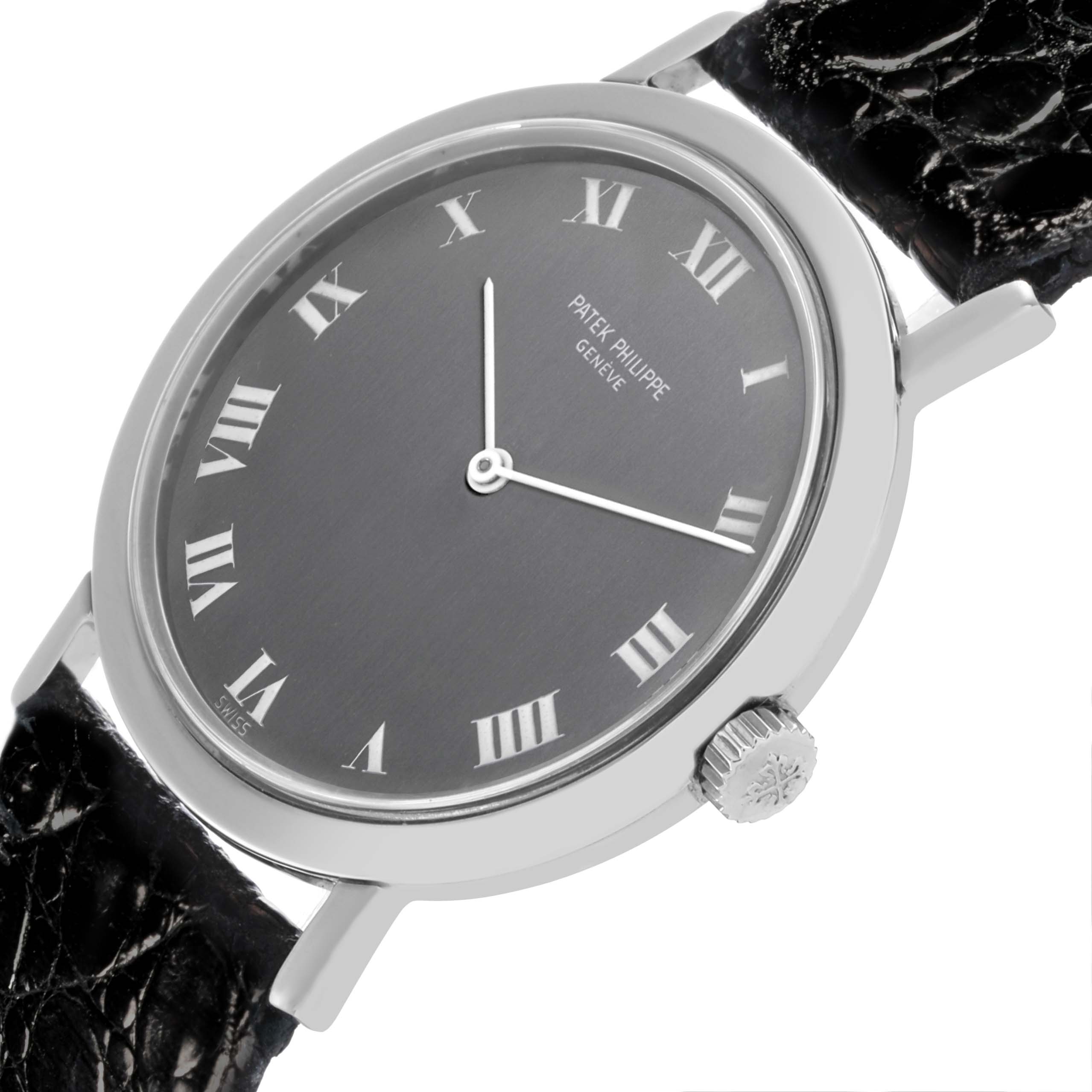 The image shows a Patek Philippe Calatrava 3509A Men's Stainless Steel Grey Dial 3509A Men's Stainless Steel Grey Dial watch at an oblique angle, highlighting the face, Roman numerals, and crown detailing.