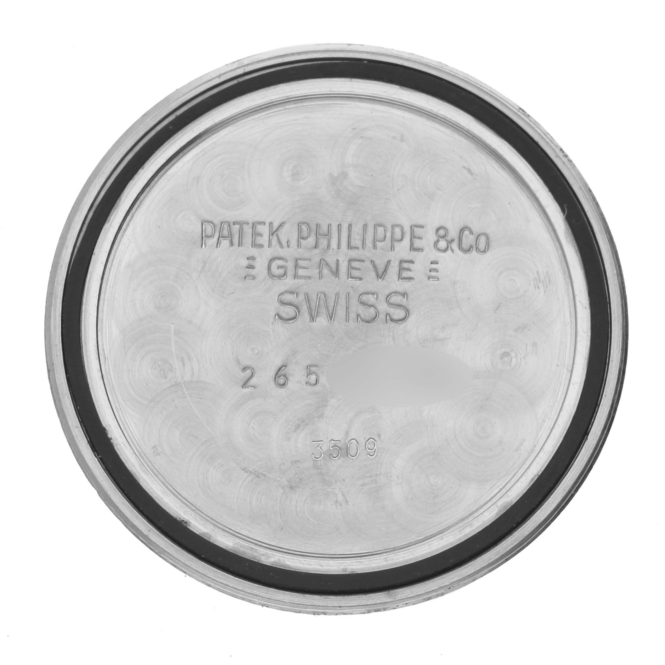 The image shows the interior of the case back of a Patek Philippe Calatrava 3509A Men's Stainless Steel Grey Dial 3509A Men's Stainless Steel Grey Dial watch.