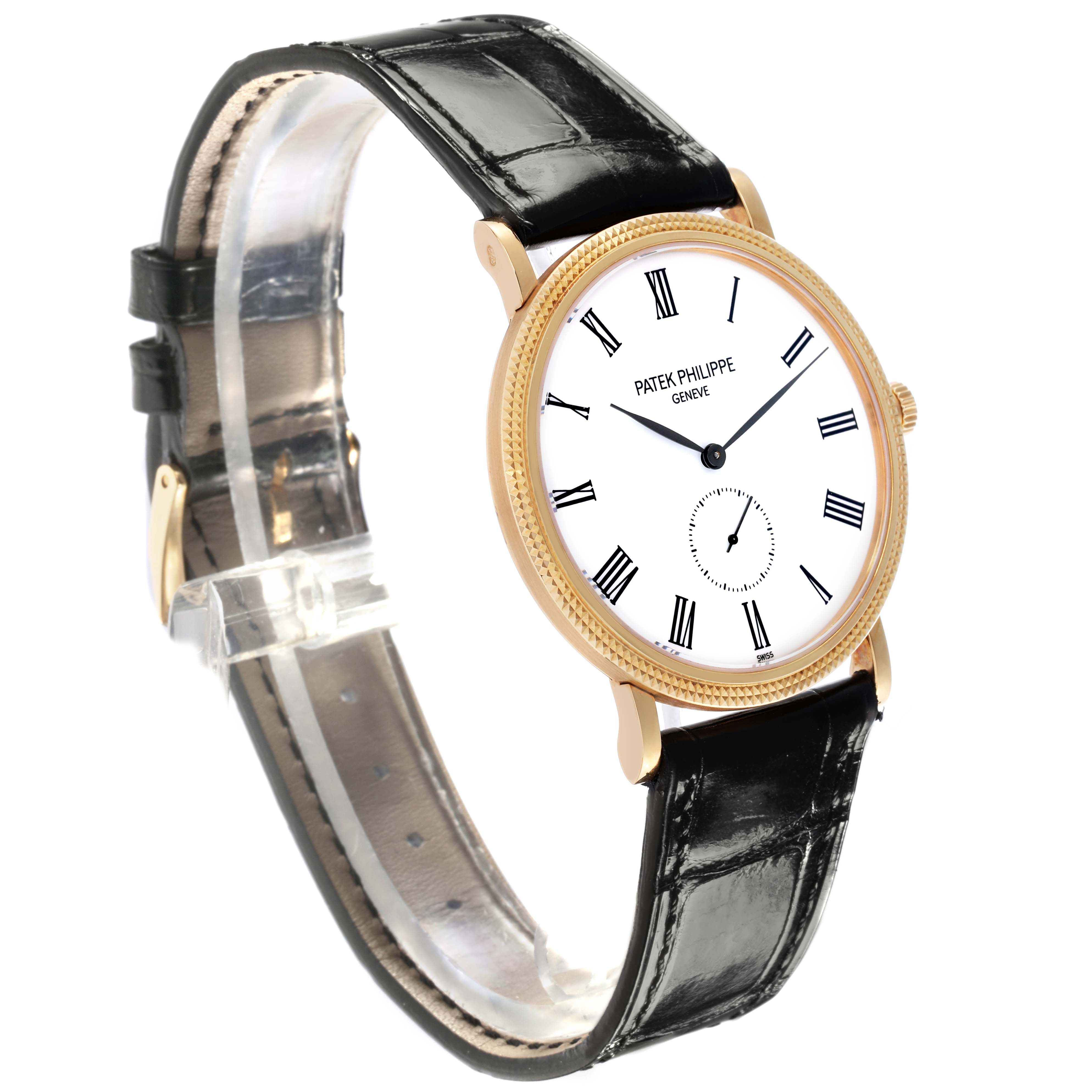 The Patek Philippe Calatrava 5119J-001 Men's Yellow Gold White Dial 5119J-001 Men's Yellow Gold White Dial watch is shown at a three-quarter angle, highlighting its dial, bezel, and leather strap.