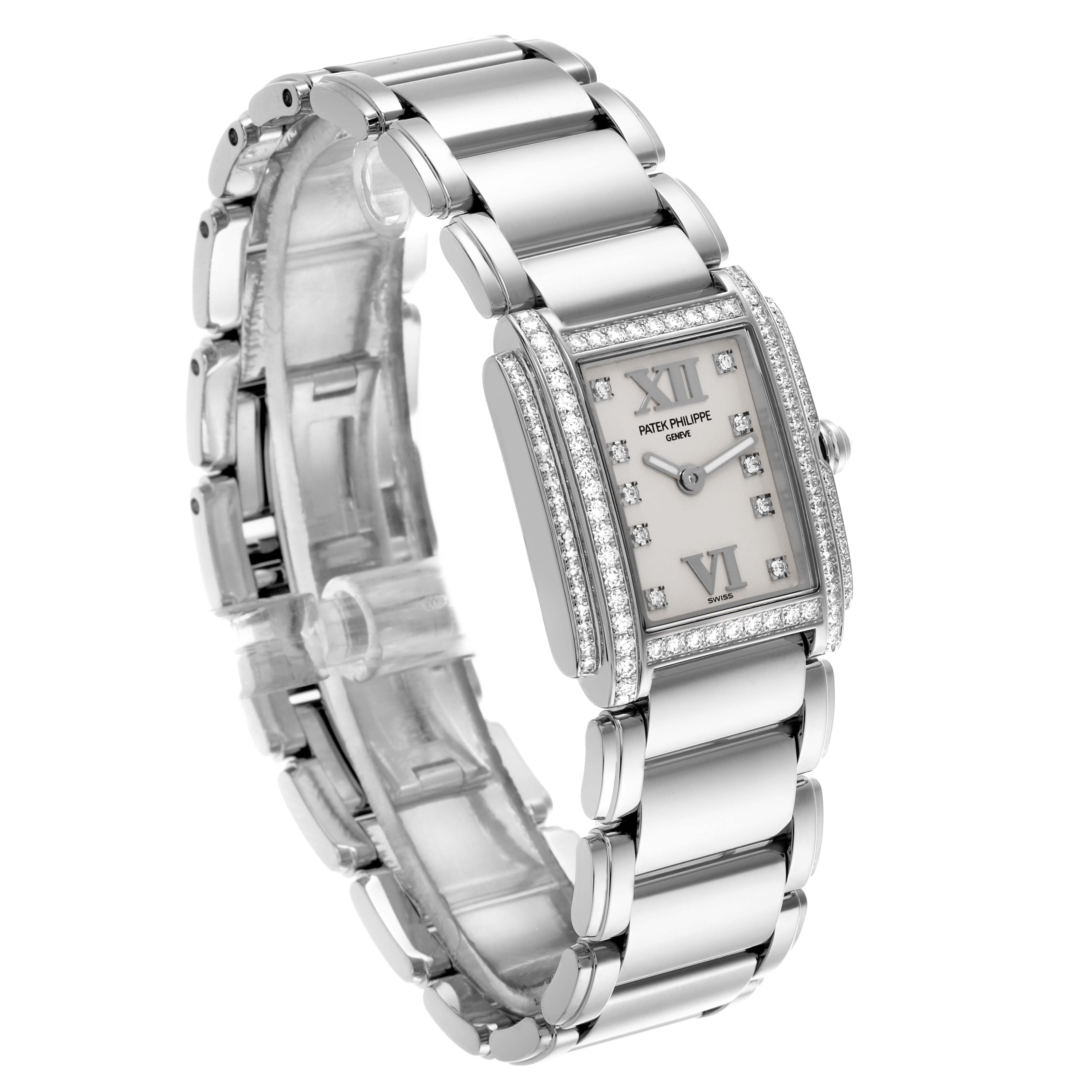 The Patek Philippe Twenty-4 4908/200G-011 Women's White Gold Silver Dial 4908/200G-011 Women's White Gold Silver Dial watch is shown at a three-quarter angle, highlighting the bracelet and diamond-set rectangular case.