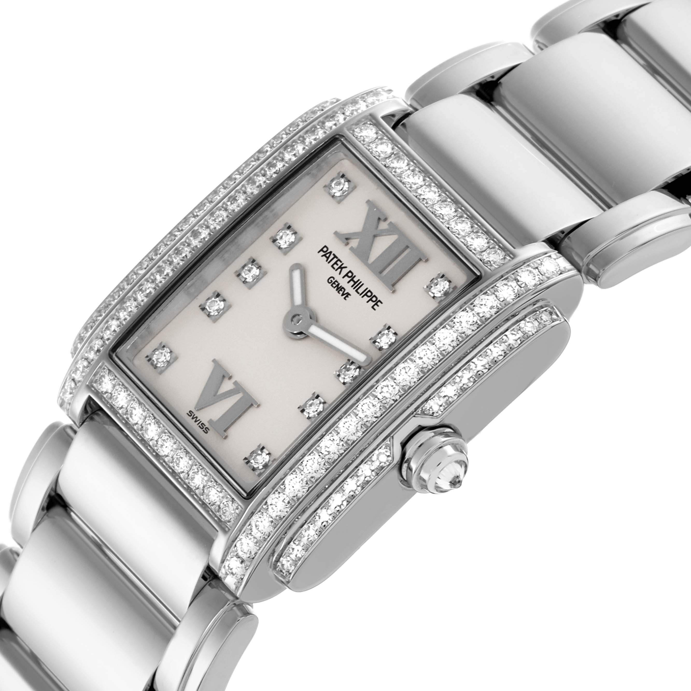 The Patek Philippe Twenty-4 4908/200G-011 Women's White Gold Silver Dial 4908/200G-011 Women's White Gold Silver Dial watch is shown at an angled close-up, highlighting its diamond-set bezel and bracelet.