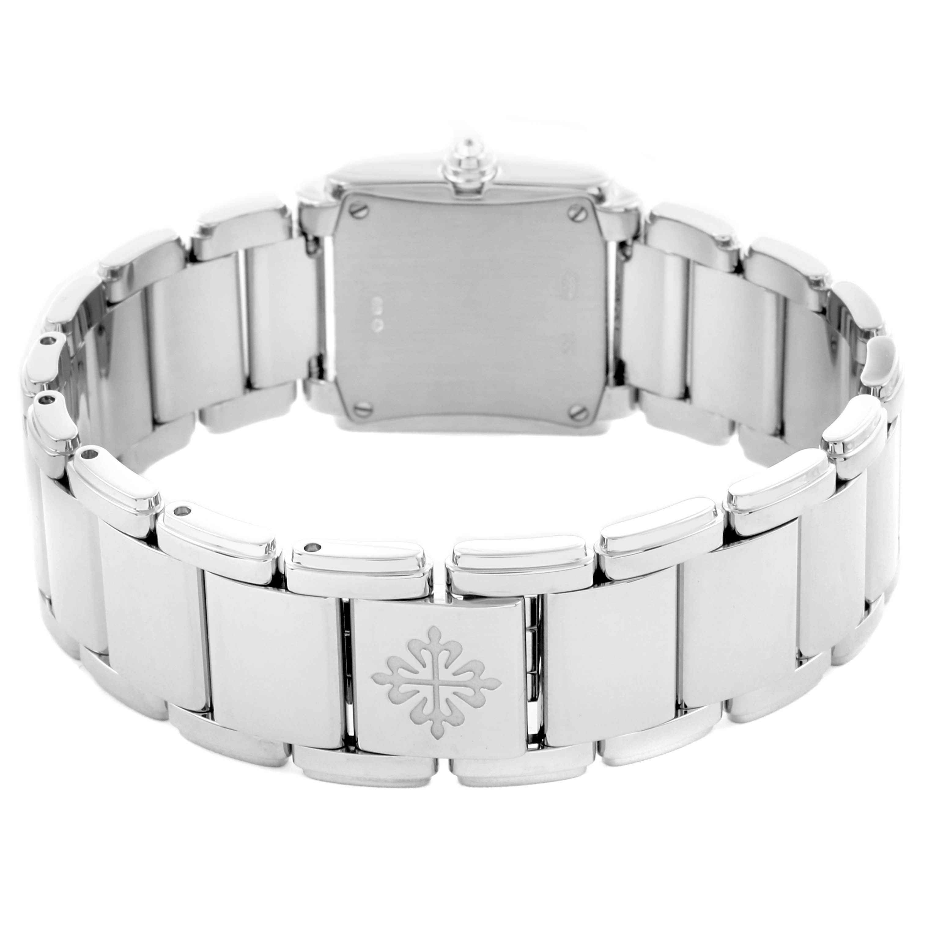 The image shows the back view of the Patek Philippe Twenty-4 4908/200G-011 Women's White Gold Silver Dial 4908/200G-011 Women's White Gold Silver Dial watch, highlighting the bracelet and clasp with the brand emblem.