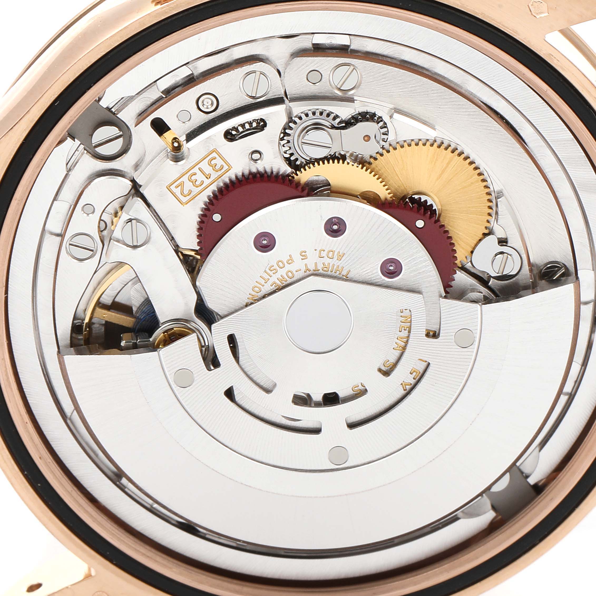 The image shows a close-up view of the back of the Rolex Cellini 50505 Men's Rose Gold Black Dial 50505 Men's Rose Gold Black Dial watch, revealing its intricate mechanical movement and gears.