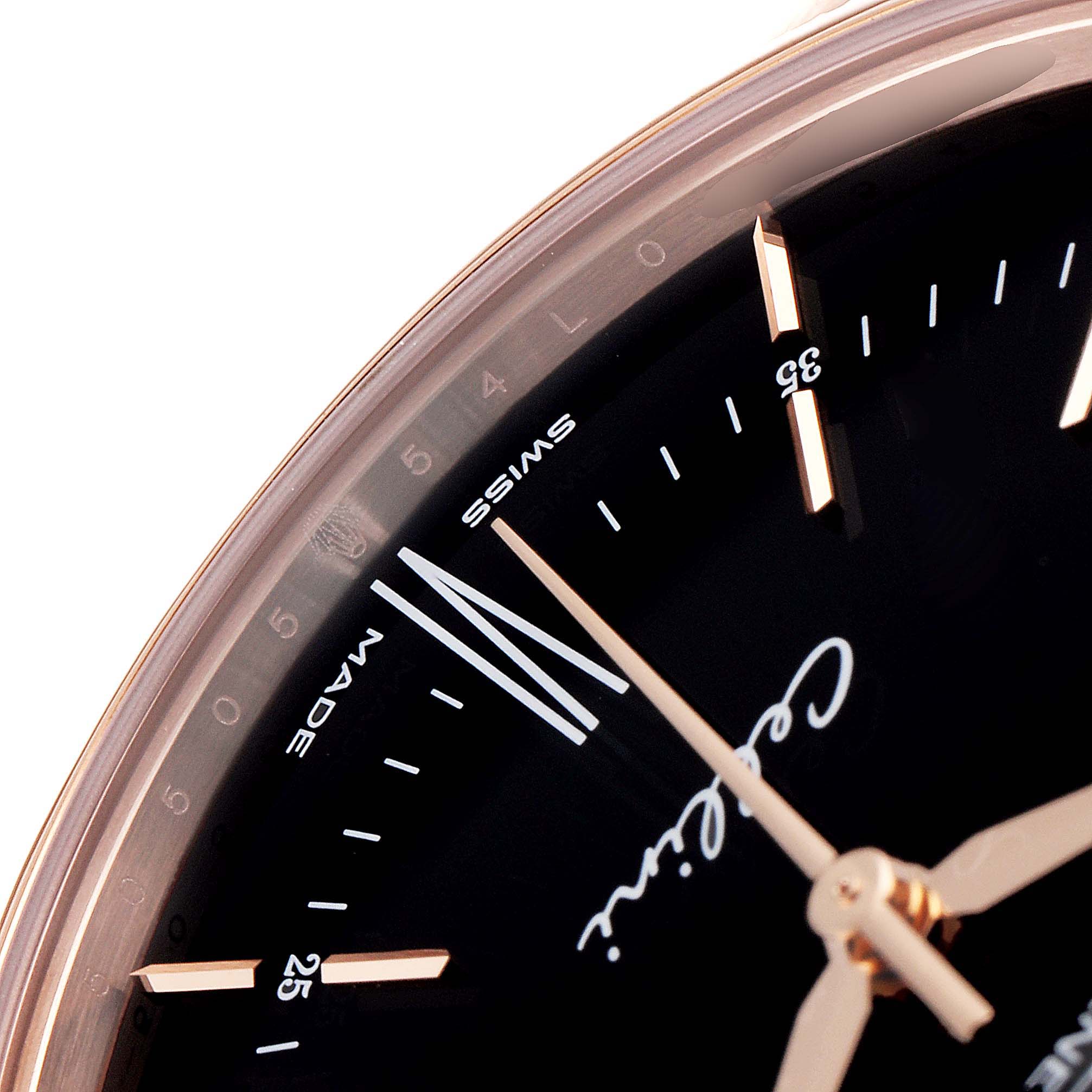 This close-up image of the Rolex Cellini 50505 Men's Rose Gold Black Dial 50505 Men's Rose Gold Black Dial watch shows a partial view of the dial with markers and hands.