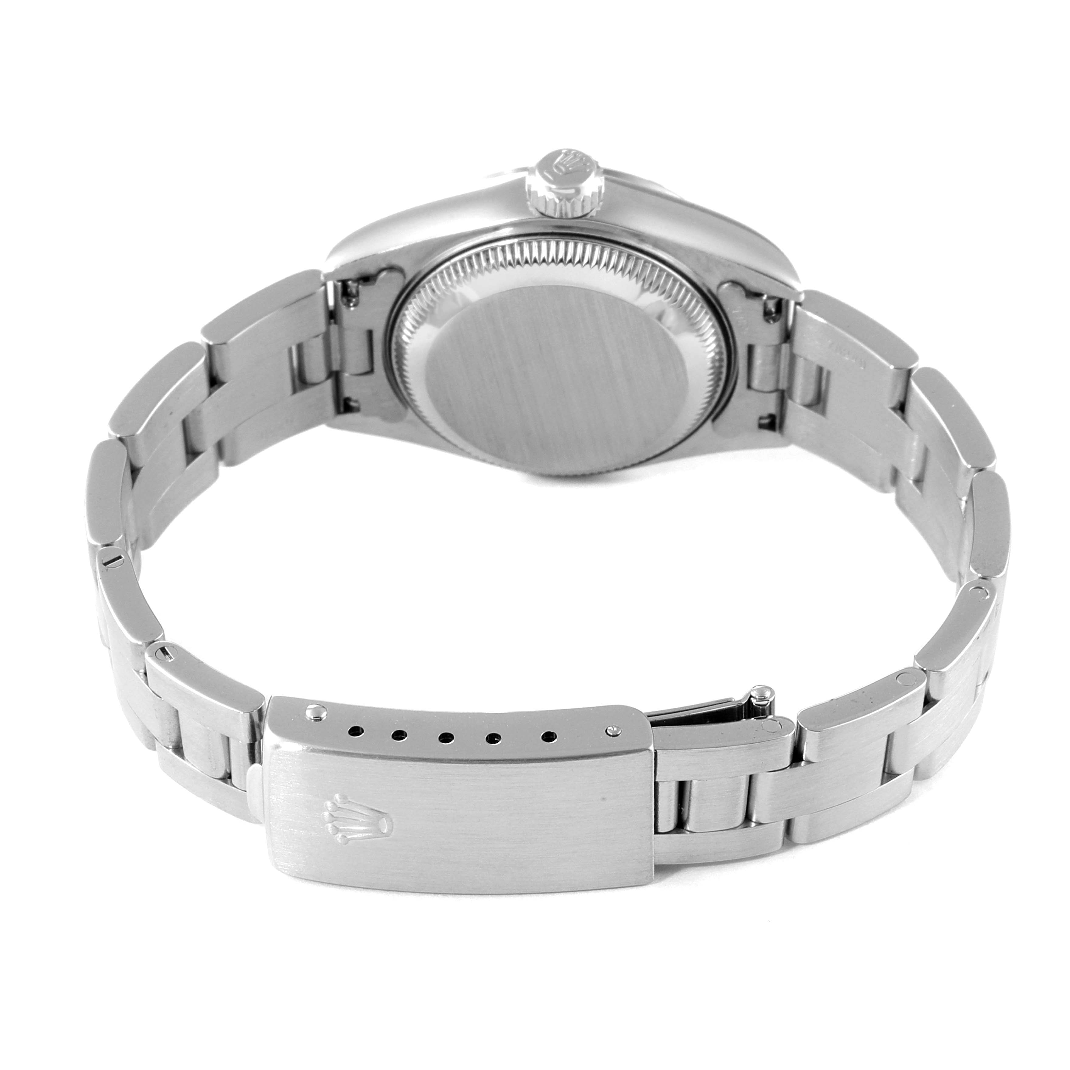 The image shows the back view of a Rolex Date 69190 Women's Stainless Steel White Dial 69190 Women's Stainless Steel White Dial model watch, highlighting the case back, crown, and metal bracelet with clasp.