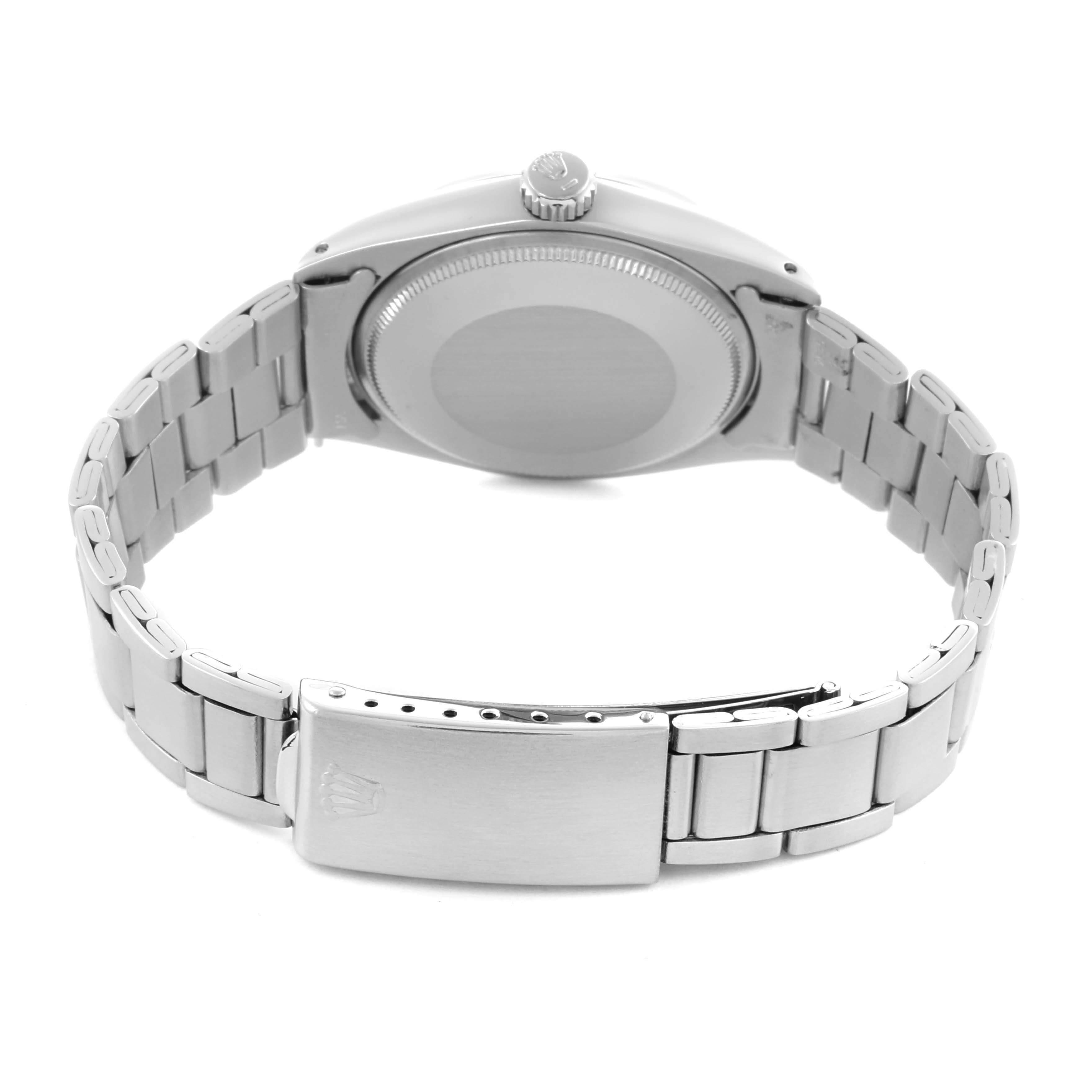The image shows the back of a Rolex Date 1500 Men's Stainless Steel Silver Dial 1500 Men's Stainless Steel Silver Dial model, highlighting the case back and metal bracelet clasp.