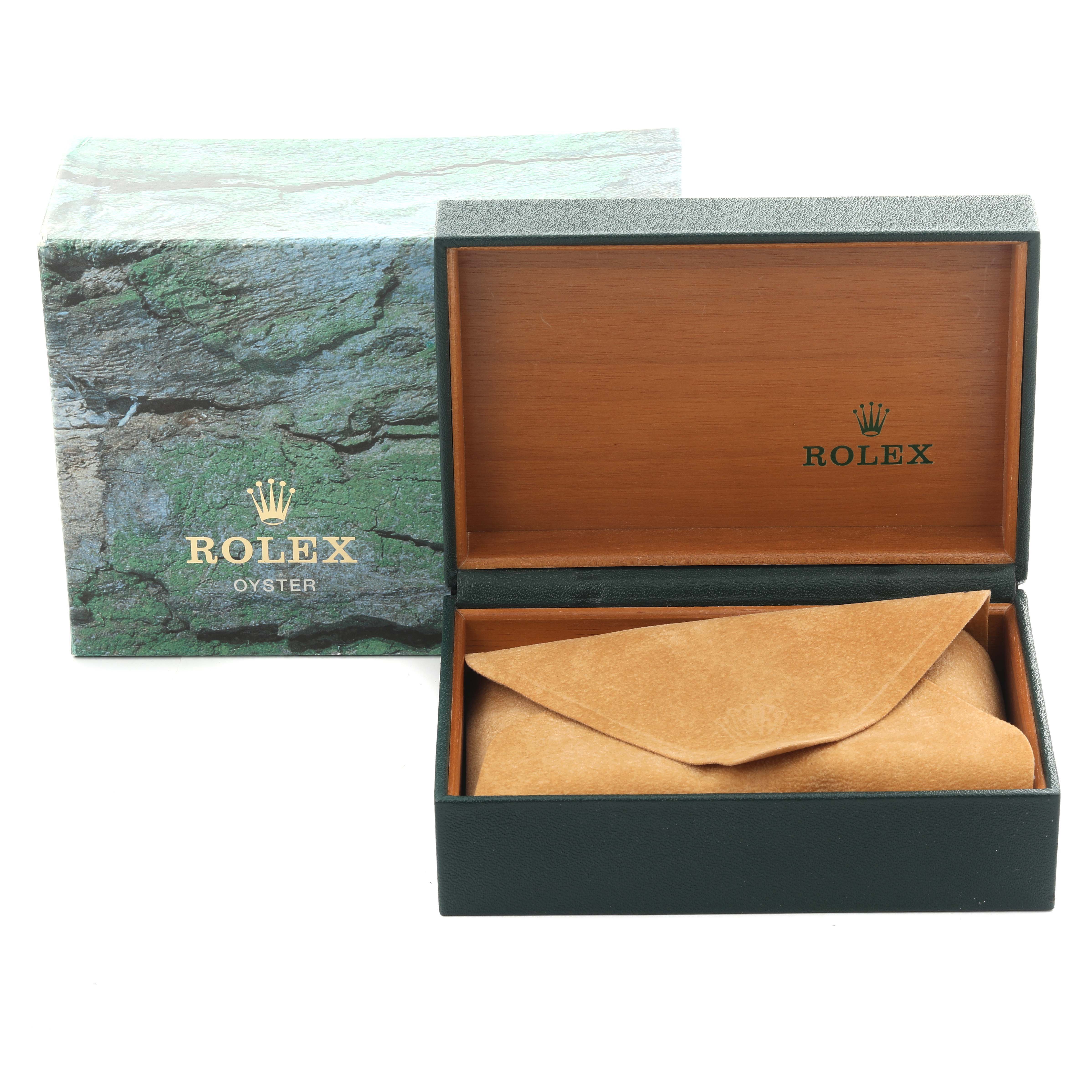 The image shows a Rolex Date 15203 Men's Steel and Gold (two tone) Silver Dial 15203 Men's Steel and Gold (two tone) Silver Dial model watch box and outer packaging, with the inner box open and a protective pouch inside.