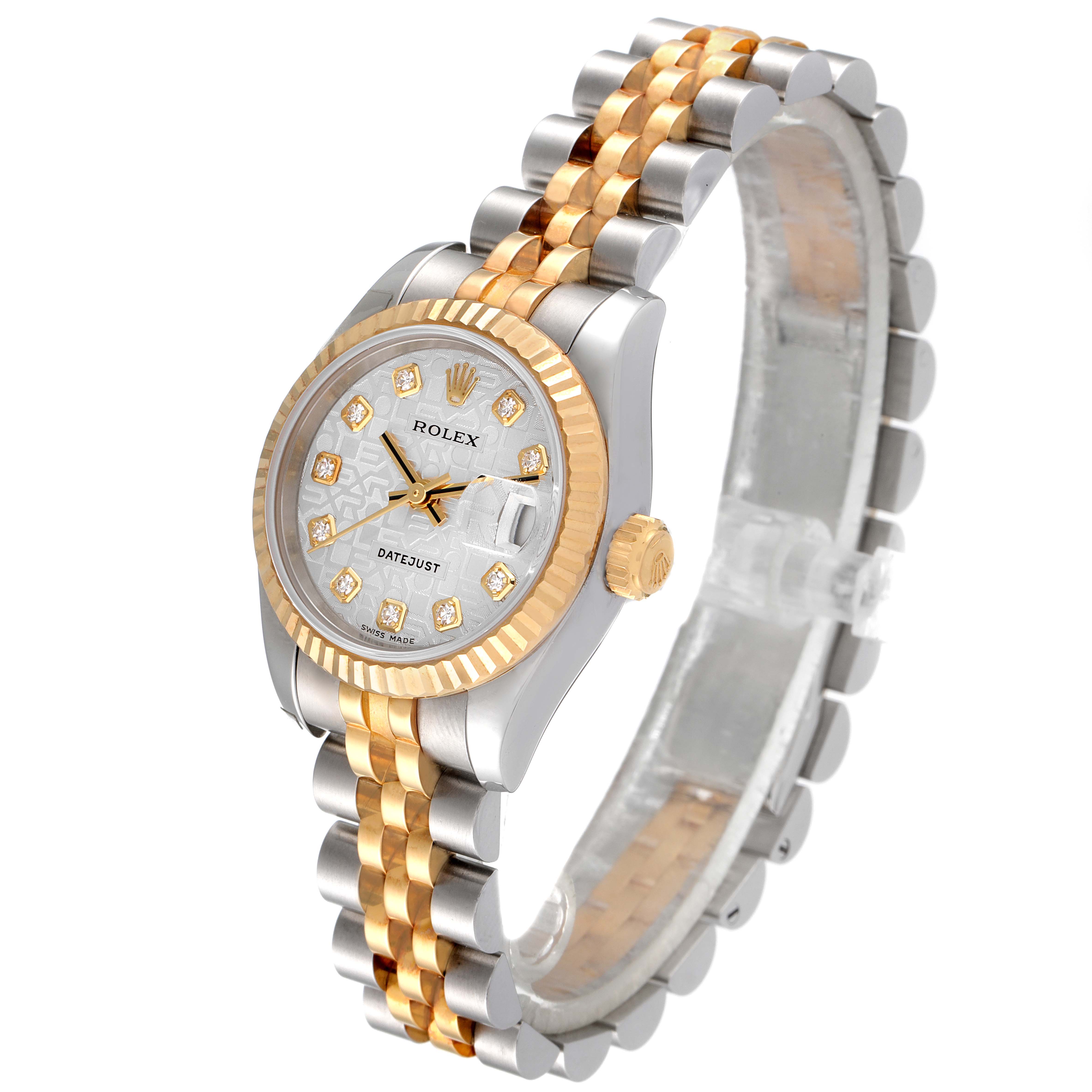 The Rolex Datejust 179173 Women
s Steel and Gold (two tone) Silver Dial 179173 Women
s Steel and Gold (two tone) Silver Dial watch is shown at an angled side view, displaying the dial, bezel, case, crown, and bracelet.