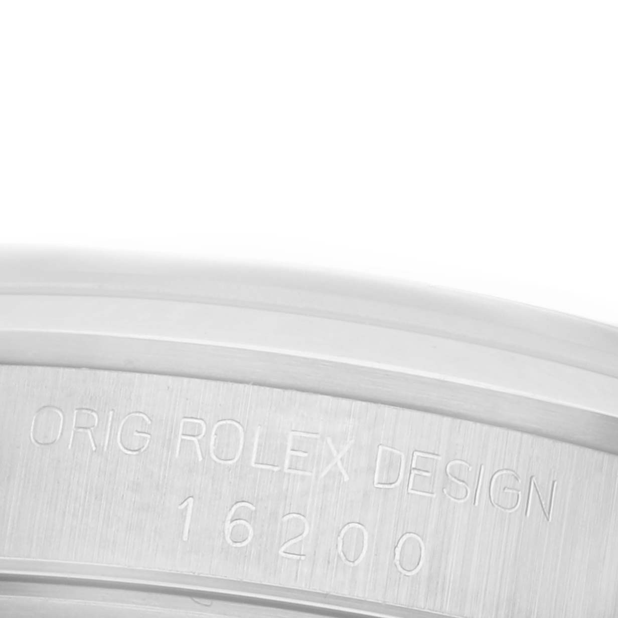 The image shows a close-up of the inner side of a Rolex Datejust 16200 Men's Stainless Steel White Dial 16200 Men's Stainless Steel White Dial's bezel, featuring the model number "16200."