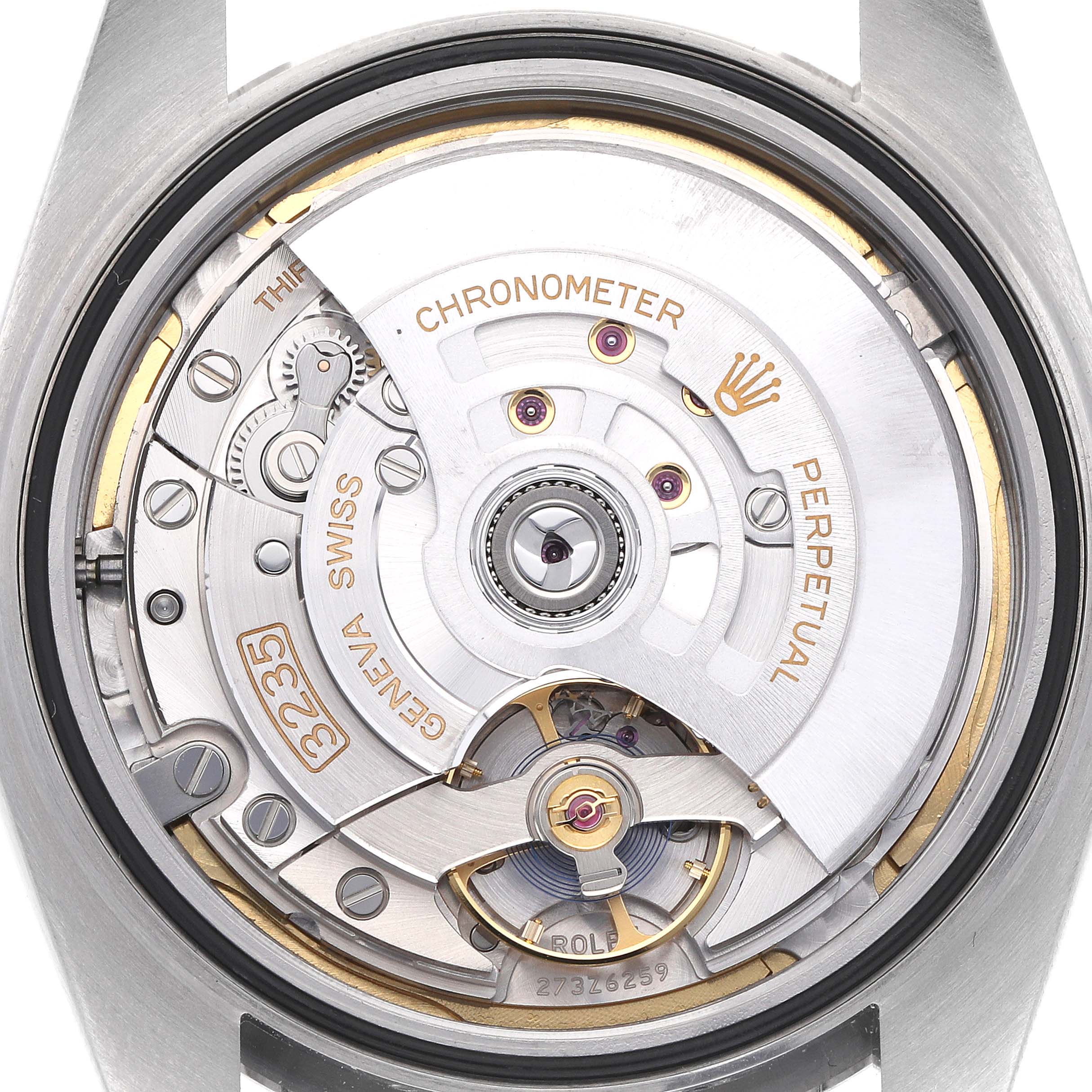 The image shows the movement of a Rolex Datejust 41 126300 Men's Stainless Steel Blue Dial 126300 Men's Stainless Steel Blue Dial from the back, highlighting the rotor and mechanical components.