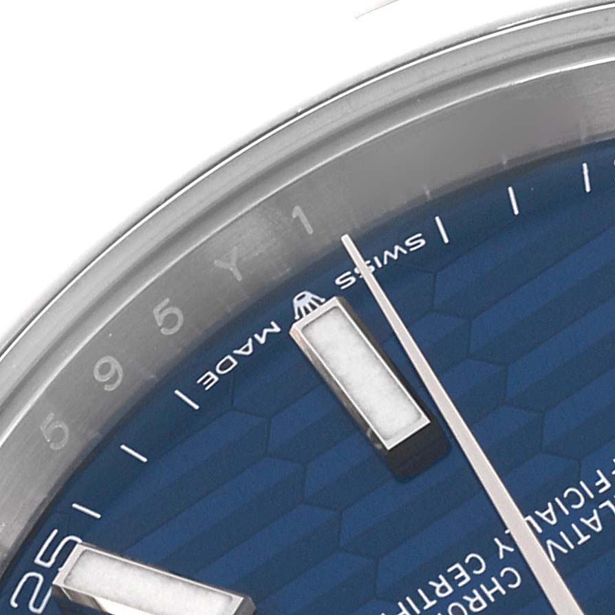 The image shows a close-up of the Rolex Datejust 41 126300 Men's Stainless Steel Blue Dial 126300 Men's Stainless Steel Blue Dial watch, featuring part of the dial, indices, and bezel.