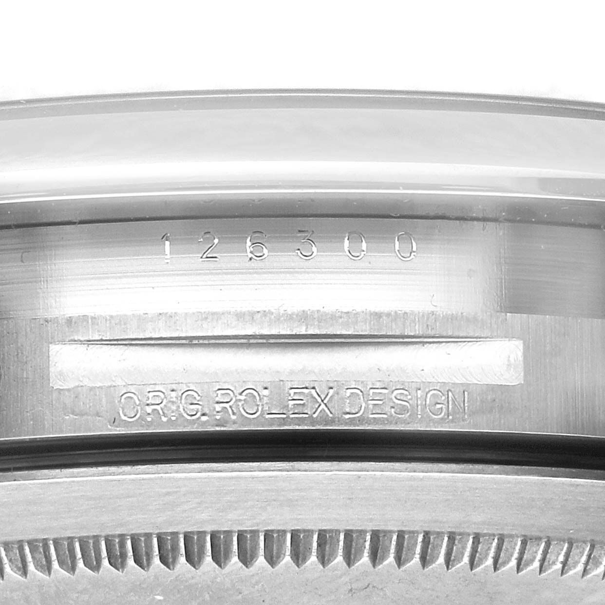 The image shows the side view of the Rolex Datejust 41 126300 Men's Stainless Steel Blue Dial 126300 Men's Stainless Steel Blue Dial watch, focusing on the model number and "ORIG ROLEX DESIGN" engraving.