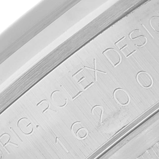 This close-up image shows the serial number engraving on the back case of a Rolex Datejust 16200 Men's Stainless Steel Blue Dial 16200 Men's Stainless Steel Blue Dial watch.