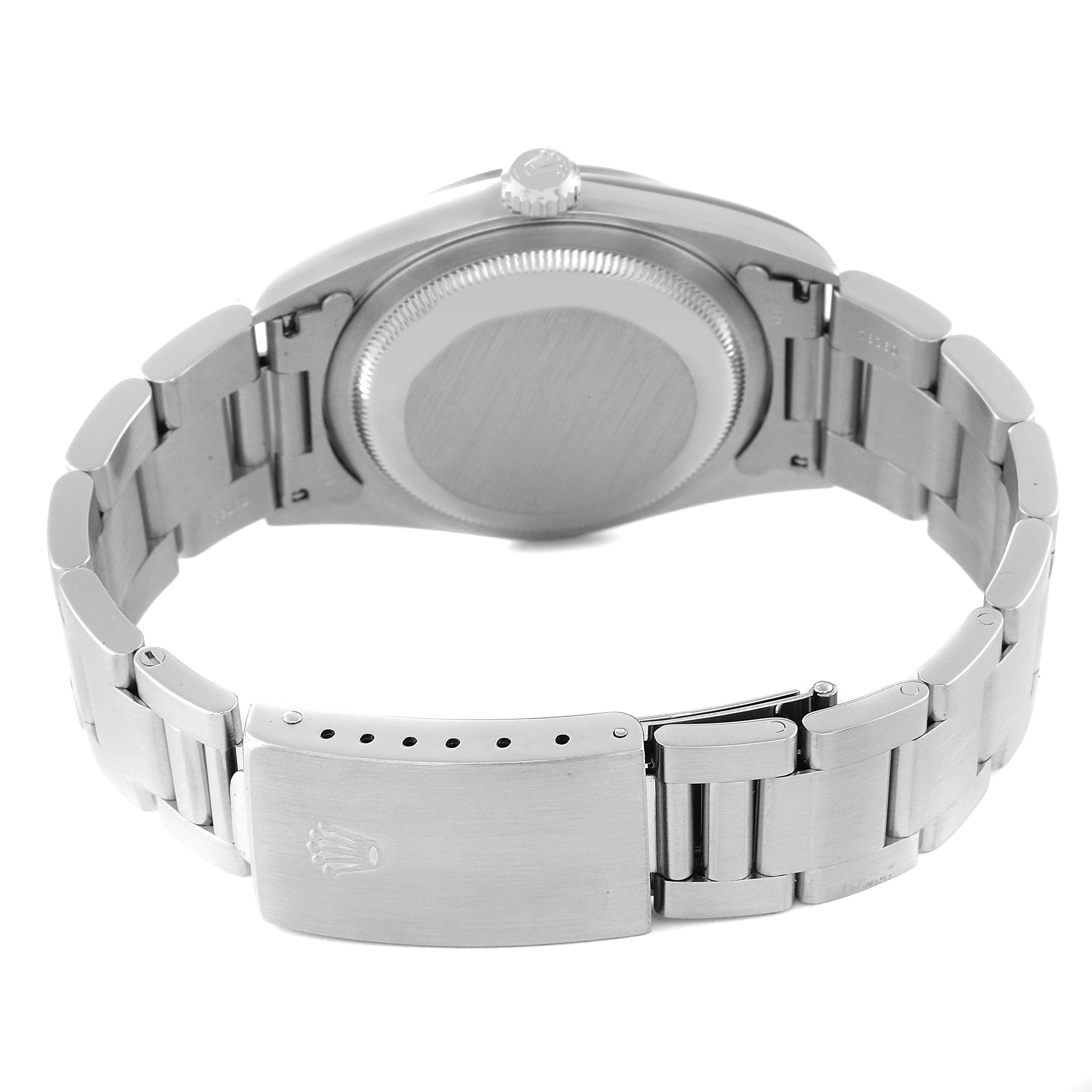 This image shows the back and clasp of the Rolex Datejust 16200 Men's Stainless Steel Blue Dial 16200 Men's Stainless Steel Blue Dial watch in a partially open position.