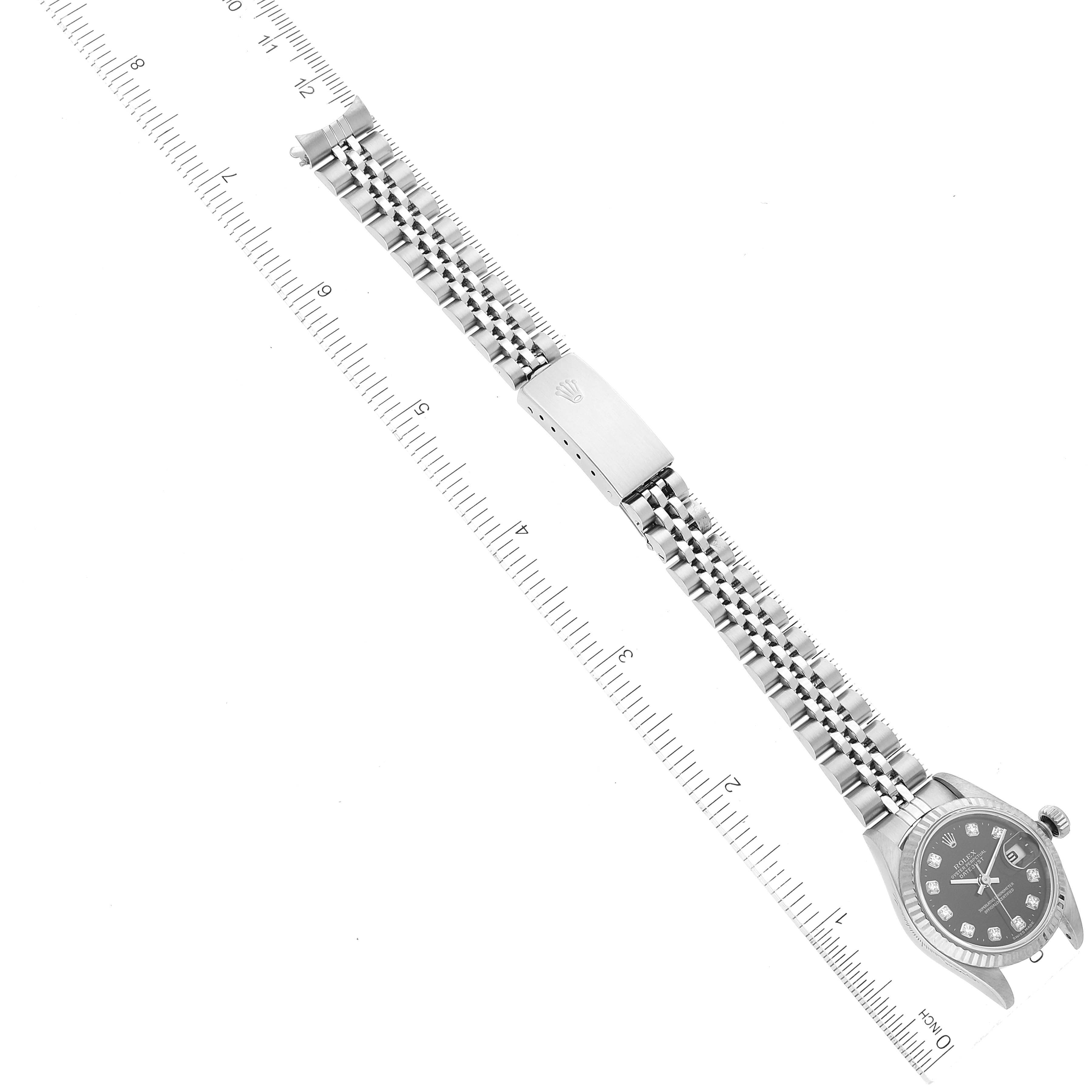 The image shows a side view of a Rolex Datejust 79174 Women's Stainless Steel Black Dial 79174 Women's Stainless Steel Black Dial watch, displaying the bracelet and a partial view of the dial.