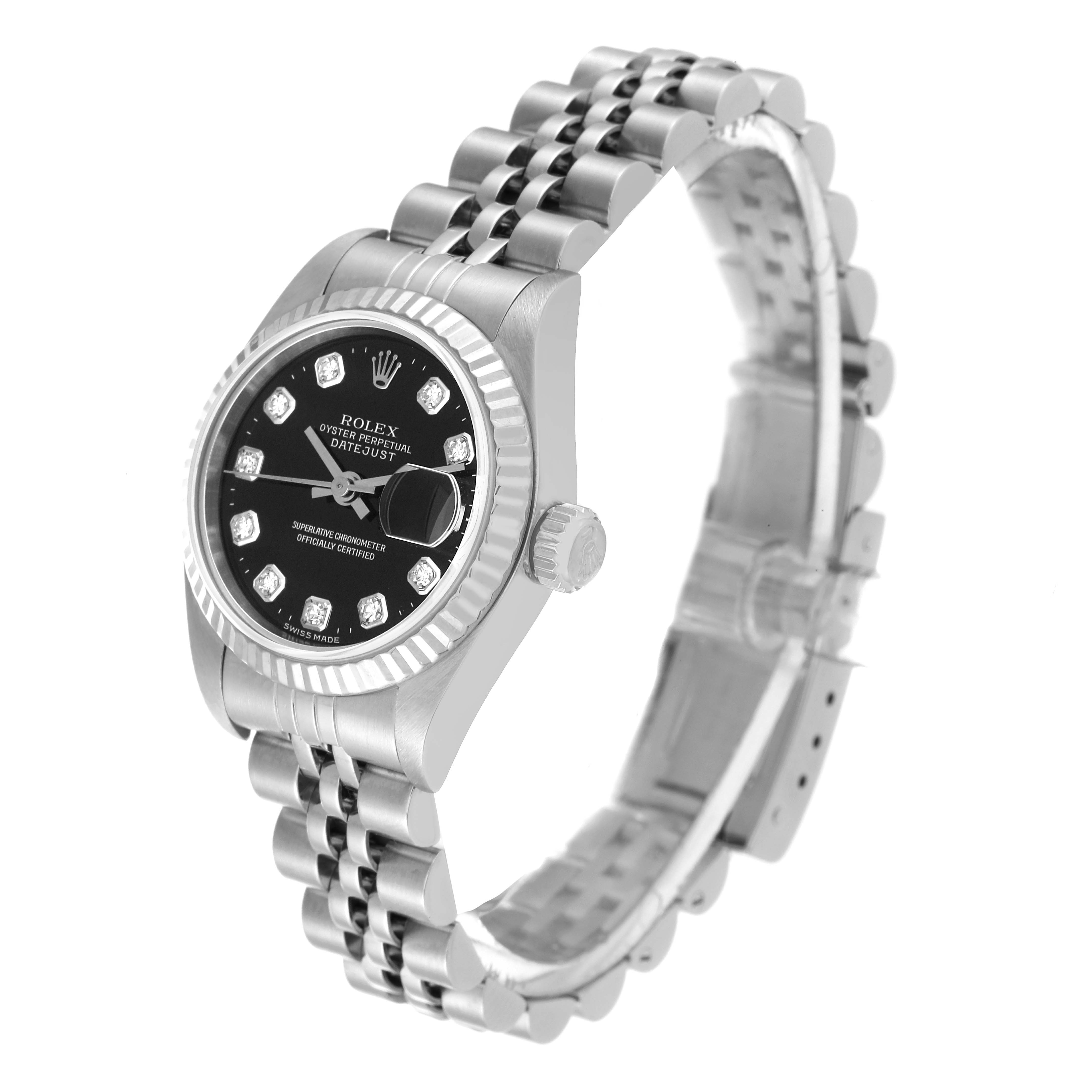 The image displays a Rolex Datejust 79174 Women's Stainless Steel Black Dial 79174 Women's Stainless Steel Black Dial watch angled to show the face, dial, bezel, crown, and bracelet.