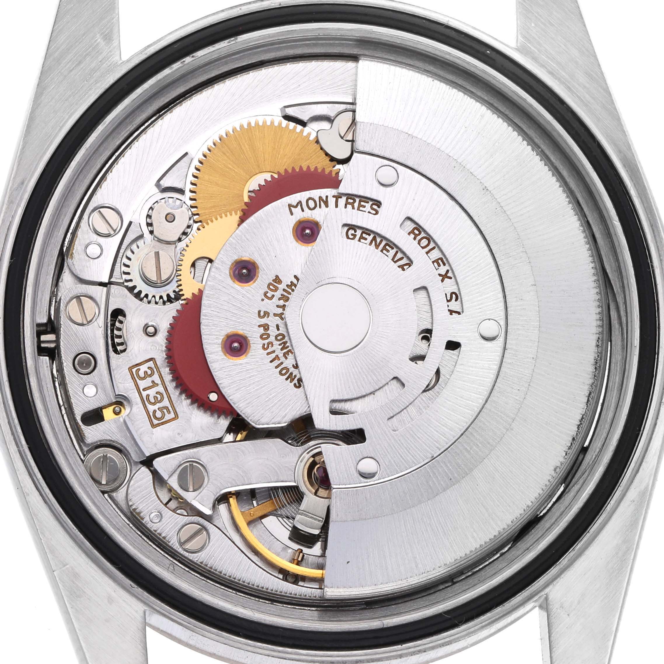 The image shows the movement of a Rolex Datejust 16234 Men's Stainless Steel Blue Dial 16234 Men's Stainless Steel Blue Dial watch from the back, highlighting gears and mechanical components.