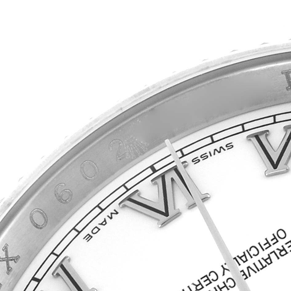 The image shows a close-up of the dial and bezel edge of a Rolex Datejust 116234 Men's Stainless Steel White Dial 116234 Men's Stainless Steel White Dial watch, highlighting the Roman numerals and minute markers.