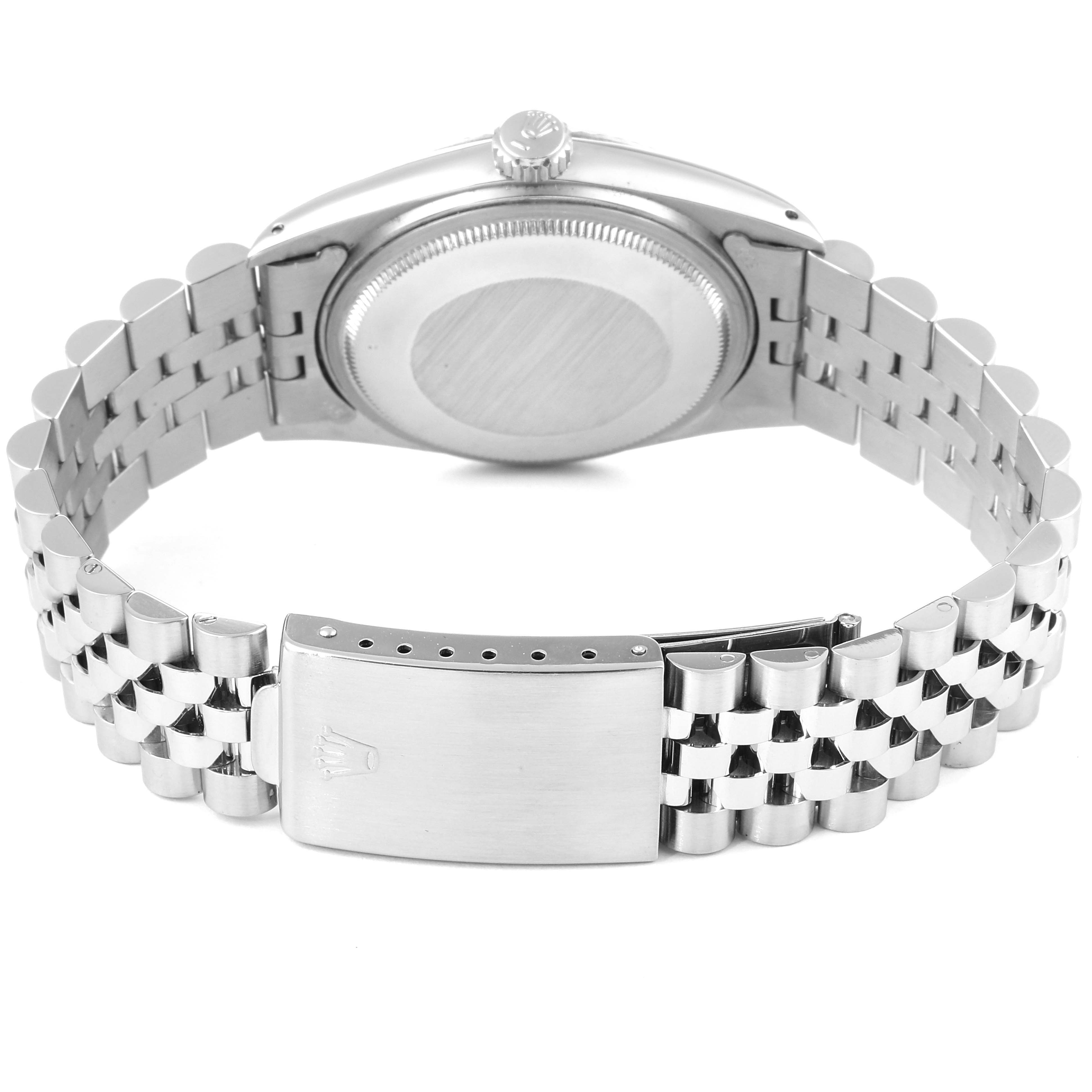 The image shows the back view of a Rolex Vintage Collection 16014 Men's Stainless Steel Silver Dial 16014 Men's Stainless Steel Silver Dial watch, focusing on the case back, crown, and metal bracelet with the clasp.