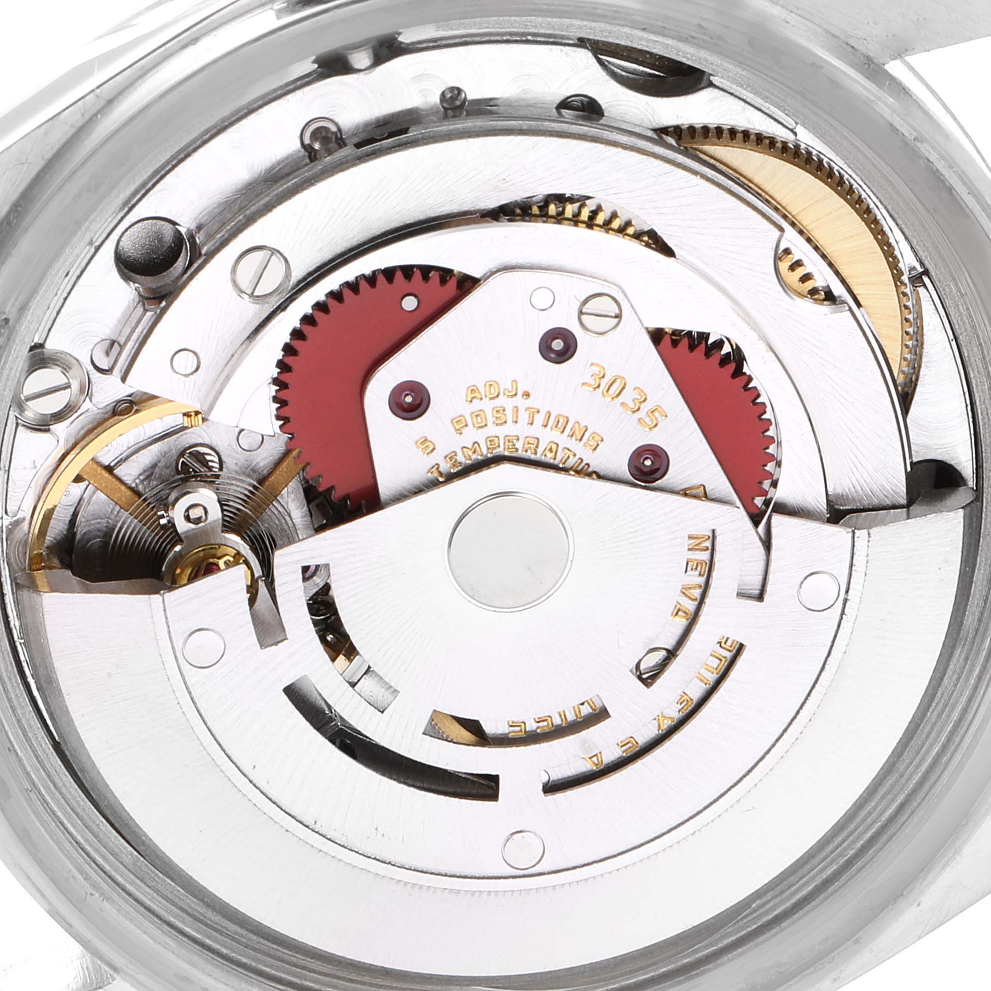 The image shows the inner mechanism of the Rolex Vintage Collection 16014 Men's Stainless Steel Silver Dial 16014 Men's Stainless Steel Silver Dial Model, focusing on its movement and gears.