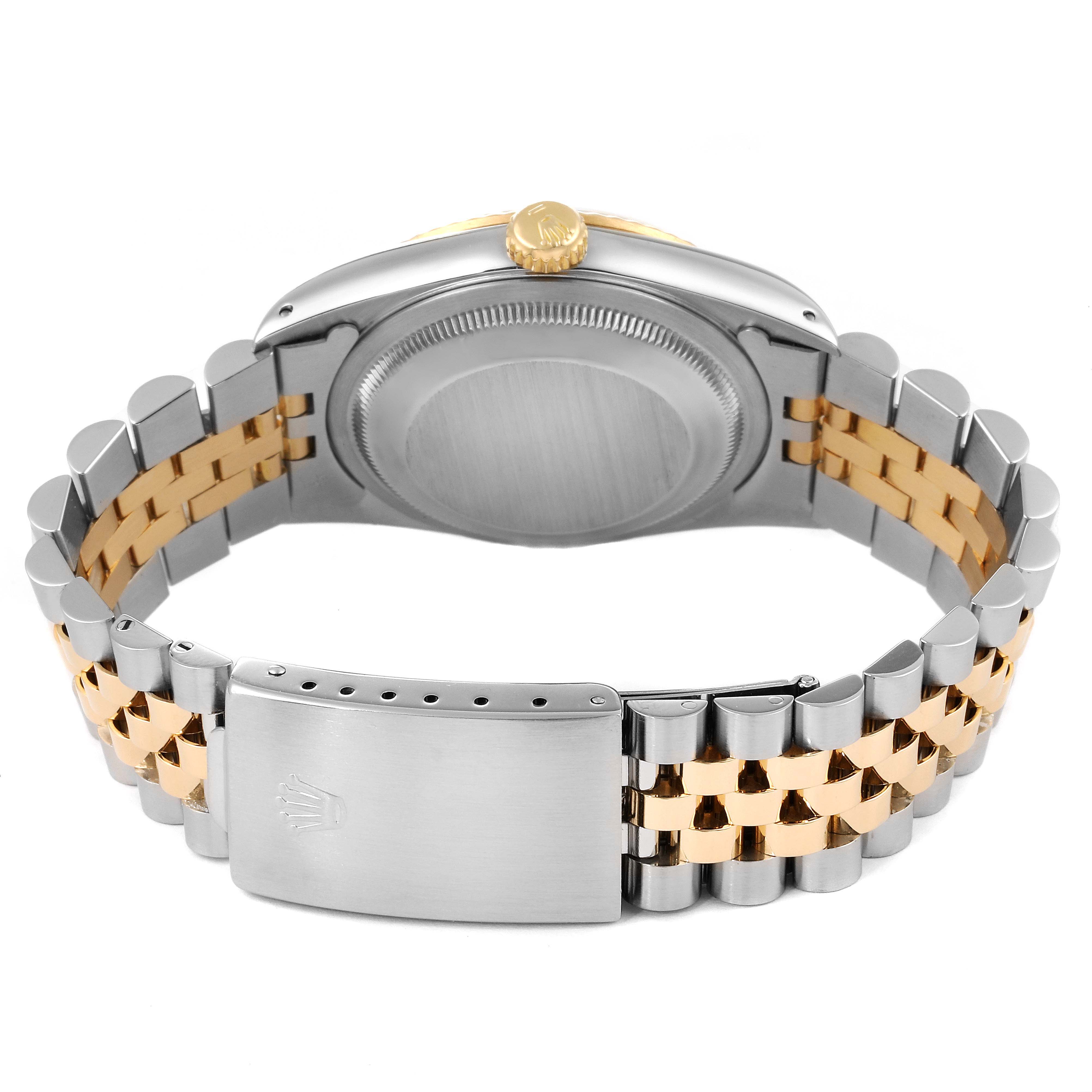 This image shows the back and bracelet clasp of a Rolex Datejust 16233 Men's Steel and Gold (two tone) White Dial 16233 Men's Steel and Gold (two tone) White Dial watch, highlighting its two-tone design.