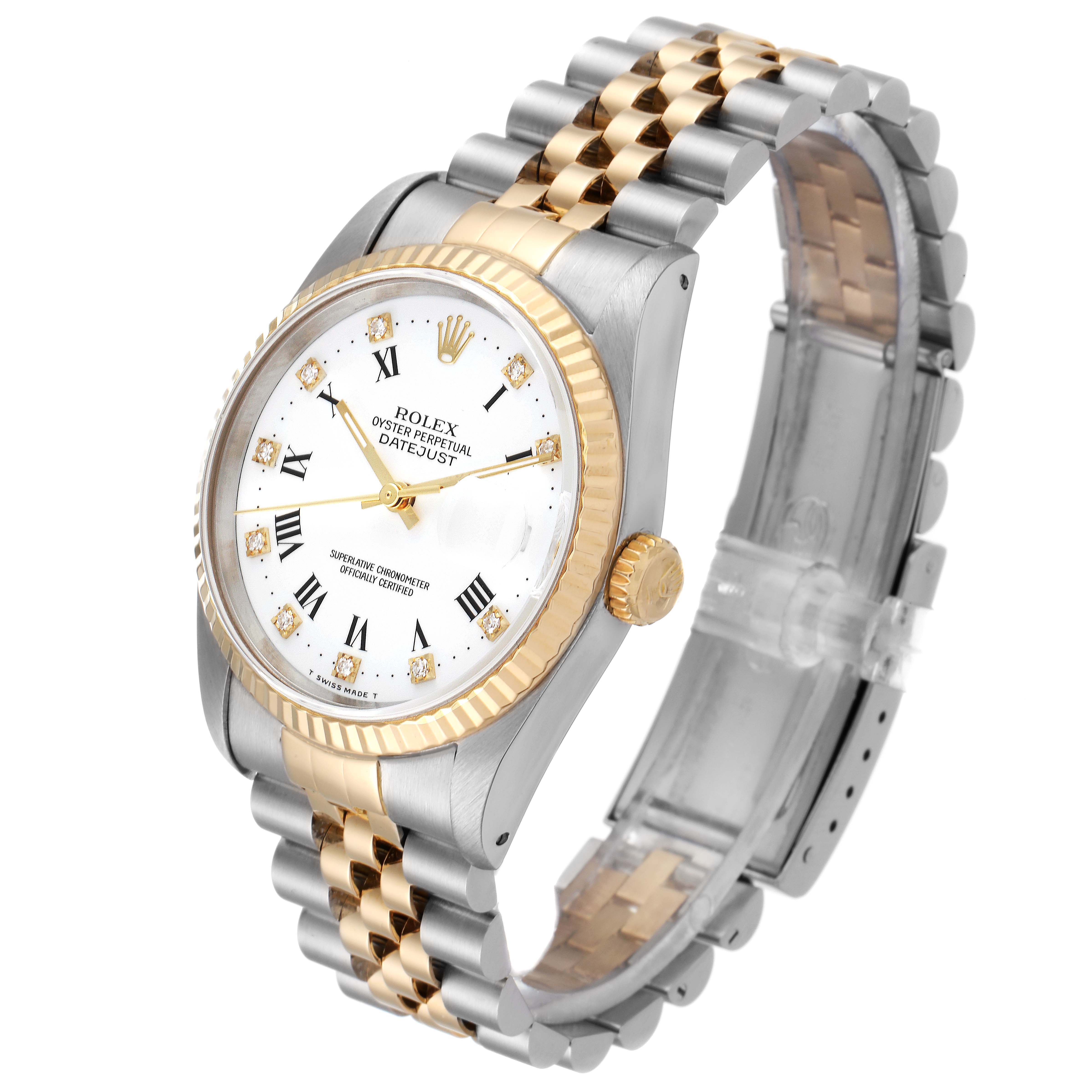 This image shows a side angle of the Rolex Datejust 16233 Men's Steel and Gold (two tone) White Dial 16233 Men's Steel and Gold (two tone) White Dial watch, highlighting its two-tone bracelet, fluted bezel, and dial.