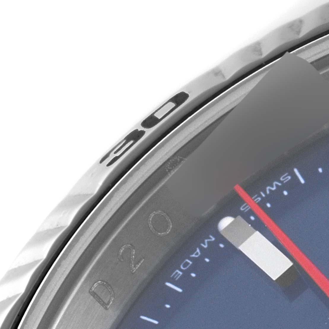 This image shows a close-up angled view of the bezel and part of the dial of a Rolex Turn-o-Graph 116264 Men
s Stainless Steel Blue Dial 116264 Men
s Stainless Steel Blue Dial watch, displaying the "30" marker.