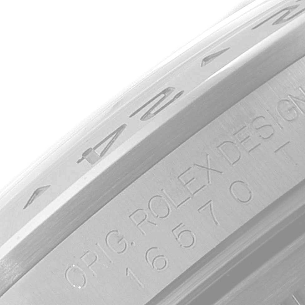 The image shows a close-up angle of the bezel and case side engraving of a Rolex Explorer 16570 Men's Stainless Steel White Dial 16570 Men's Stainless Steel White Dial watch.